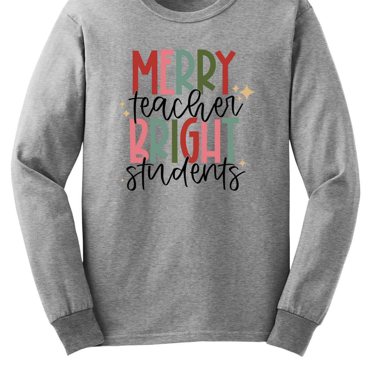 This festive t-shirt showcases the cheerful phrase "Merry Teacher Bright Students" in a delightful design. The words "MERRY" and "BRIGHT" are prominently featured in a blocky yet playful font, with each letter bursting in a vibrant mix of shades of green and red, evoking the spirit of the holiday season. Shop Gorgeousware.com