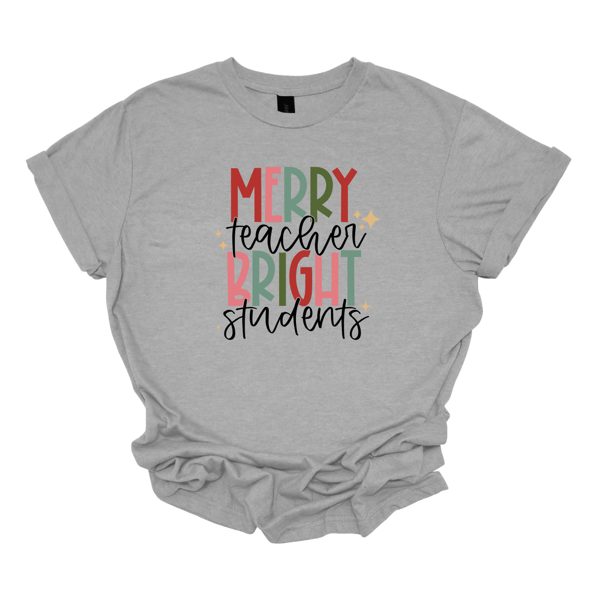 This festive t-shirt showcases the cheerful phrase "Merry Teacher Bright Students" in a delightful design. The words "MERRY" and "BRIGHT" are prominently featured in a blocky yet playful font, with each letter bursting in a vibrant mix of shades of green and red, evoking the spirit of the holiday season. Shop Gorgeousware.com