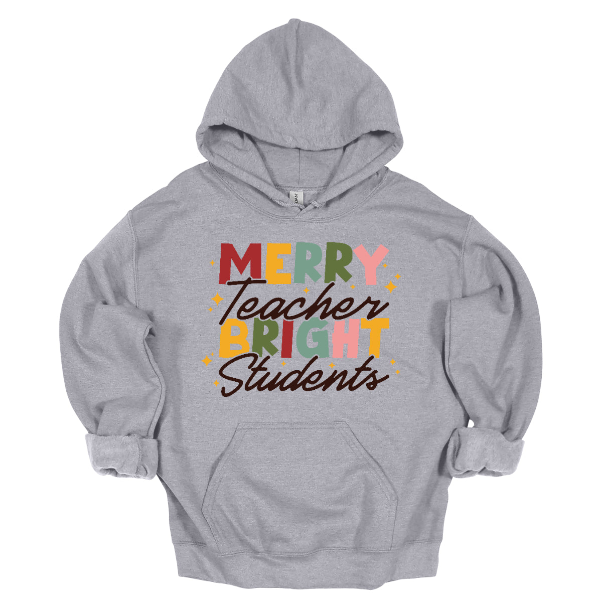 This festive t-shirt showcases the cheerful phrase "Merry Teacher Bright Students" in a delightful design. The words "MERRY" and "BRIGHT" are prominently featured in a blocky yet playful font, with each letter bursting in a vibrant mix of shades of green and red, evoking the spirit of the holiday season. Shop Gorgeousware.com