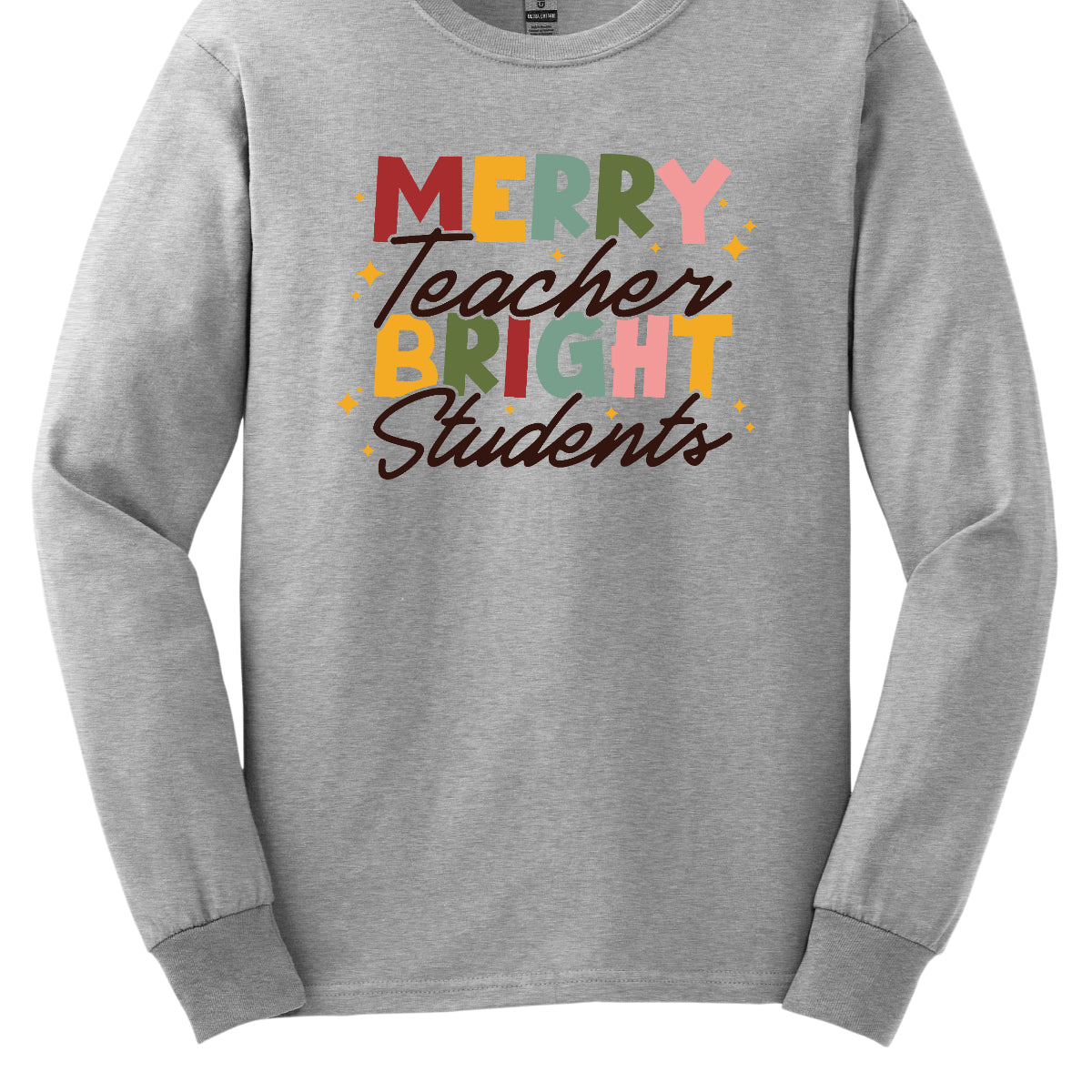 This festive t-shirt showcases the cheerful phrase "Merry Teacher Bright Students" in a delightful design. The words "MERRY" and "BRIGHT" are prominently featured in a blocky yet playful font, with each letter bursting in a vibrant mix of shades of green and red, evoking the spirit of the holiday season. Shop Gorgeousware.com