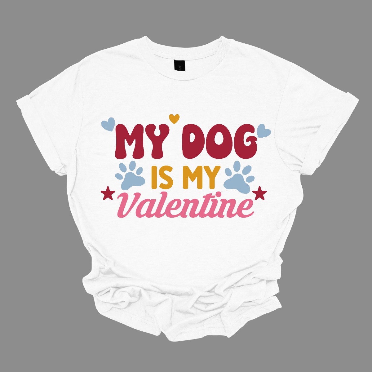 Declare your furry love story with our 'My Dog is My Valentine' T-shirt. This charming tee is a perfect expression of the deep bond between you and your canine companion. The heartfelt message takes center stage, surrounded by paw prints, capturing the unconditional love and loyalty that only a dog can offer. Shop at Gorgeousware.com today!