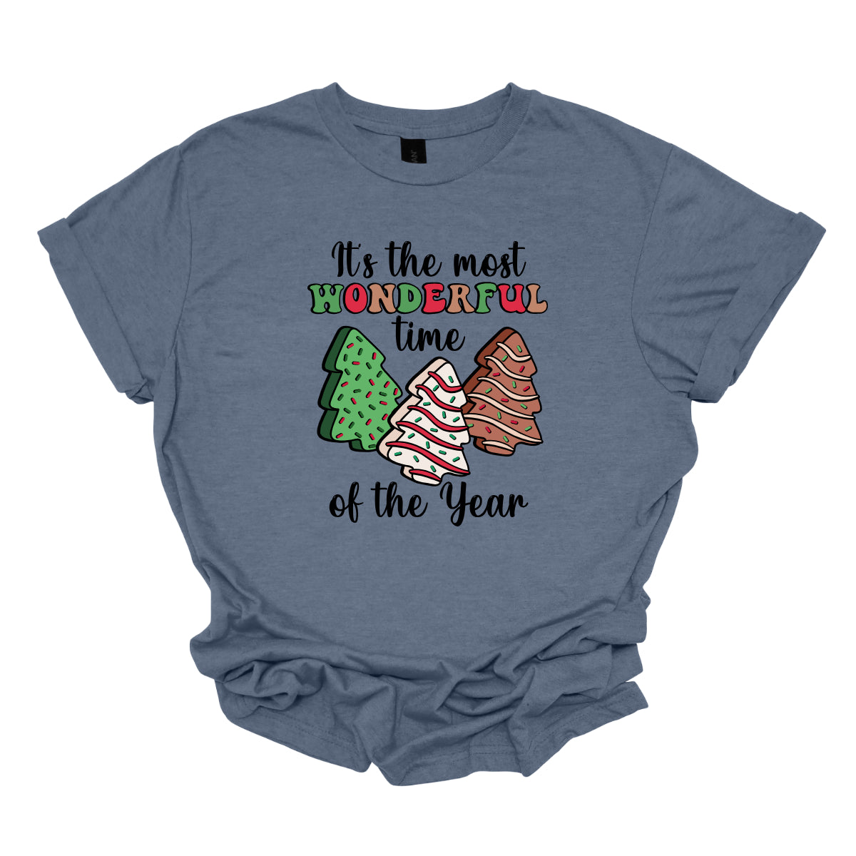 This festive t-shirt features the phrase "It's the most wonderful time of the year" in a stylish black cursive font, creating an elegant backdrop for the holiday message. The word "wonderful" stands out in a playful bubbly font that alternates between vibrant green, cheerful red, and warm brown, adding a whimsical touch. Shop Gorgeousware.com