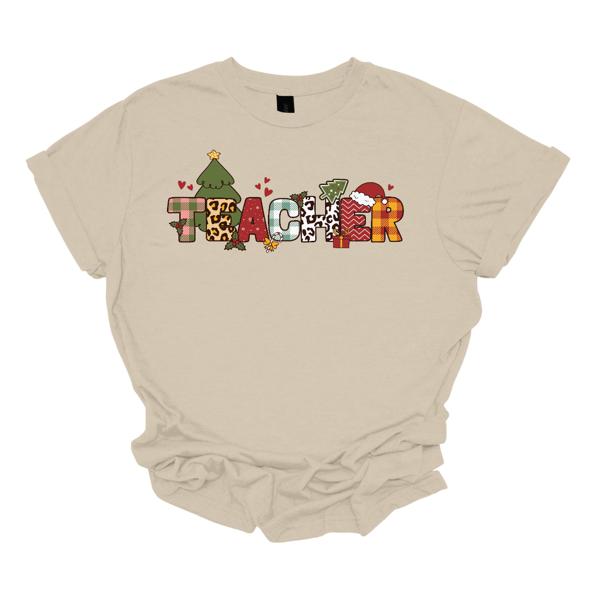 This eye-catching t-shirt boldly displays the word "TEACHER" in large block letters, each letter showcasing a unique style of print that adds a fun and creative flair. Behind the first "E," a cheerful Christmas tree adds a festive touch, while the second "E" is adorned with a cute Santa hat, making it even more playful. Shop Gorgeouswre.com