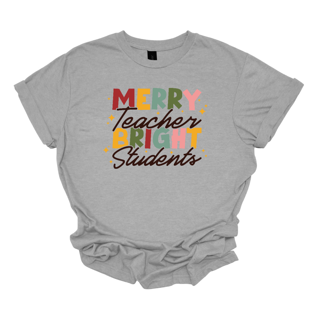 This festive t-shirt showcases the cheerful phrase "Merry Teacher Bright Students" in a delightful design. The words "MERRY" and "BRIGHT" are prominently featured in a blocky yet playful font, with each letter bursting in a vibrant mix of shades of green and red, evoking the spirit of the holiday season. Shop Gorgeousware.com