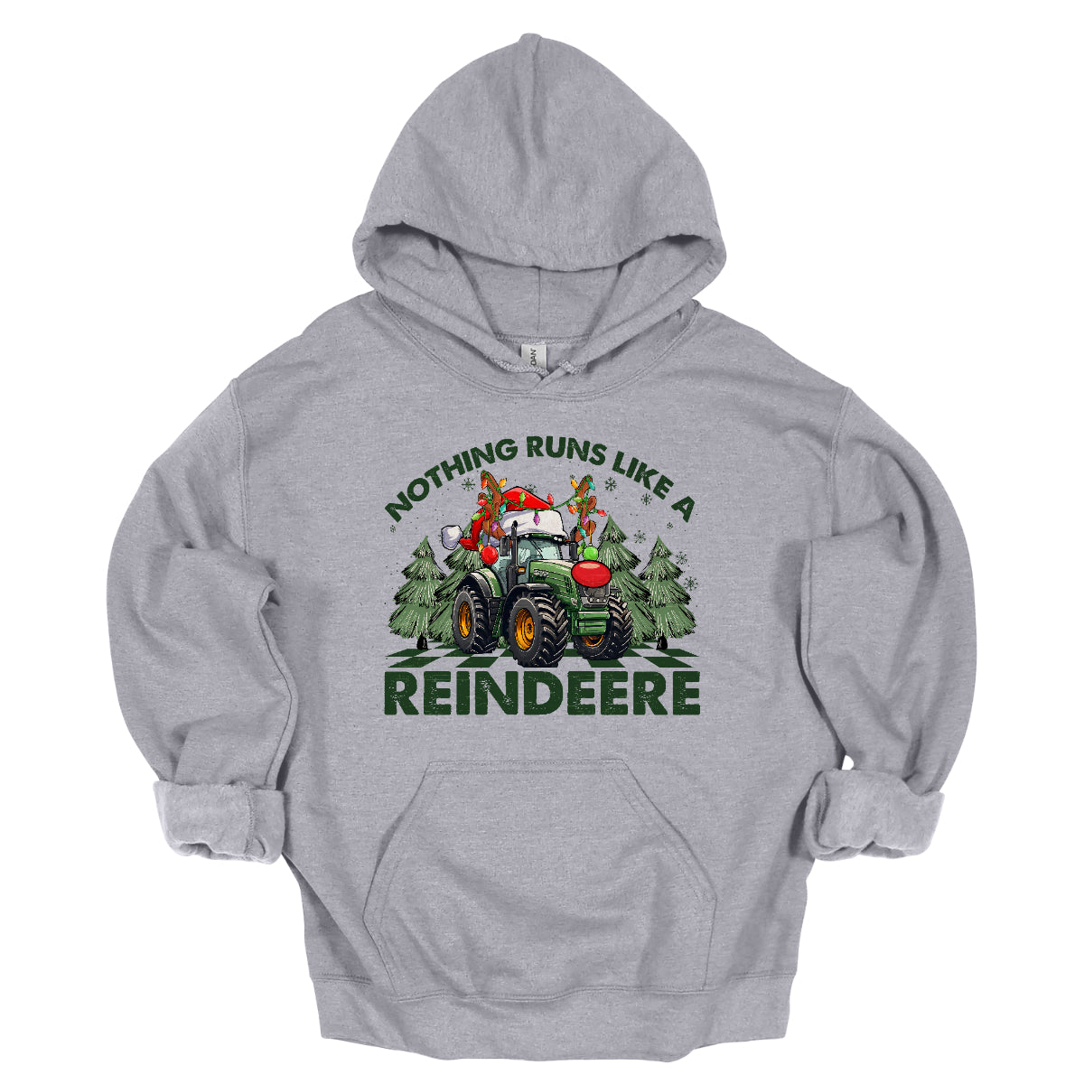 This playful t-shirt features the catchy phrase "Nothing runs like a reindeer" in bold black font, making a fun statement that’s perfect for the holiday season. At the center of the shirt, a charming John Deere tractor is decked out for Christmas: it sports a bright red nose, festive antlers, and a classic Santa hat, creating a delightful and humorous twist. The tractor is surrounded by whimsical Christmas trees, adding a cheerful backdrop that enhances the festive vibe. Shop Gorgeousware.com