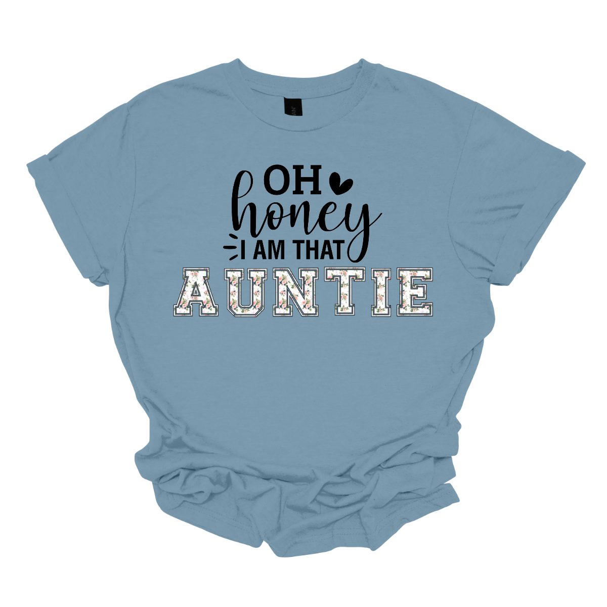 The shirt design features the phrase "Oh Honey, I'm That Auntie" in a playful and eye-catching style. The word "Auntie" is written in bold, bubbly letters filled with intricate floral patterns, giving it a soft and feminine touch. The rest of the phrase uses a mix of fun, whimsical fonts to create a lively and energetic feel. The design is perfect for a stylish and confident auntie who loves to embrace her role with charm and humor. Shop Gorgeouseware.com