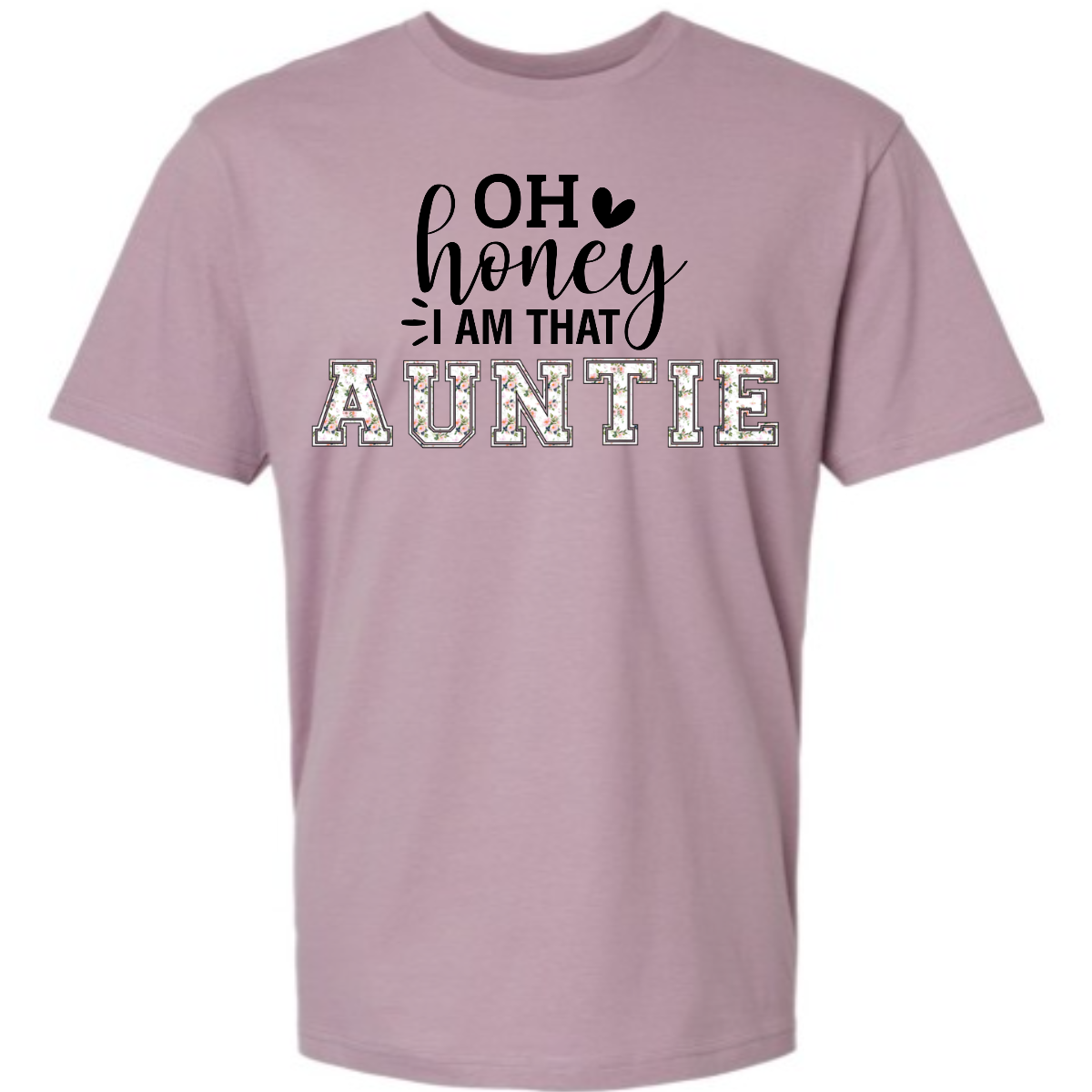 The shirt design features the phrase "Oh Honey, I'm That Auntie" in a playful and eye-catching style. The word "Auntie" is written in bold, bubbly letters filled with intricate floral patterns, giving it a soft and feminine touch. The rest of the phrase uses a mix of fun, whimsical fonts to create a lively and energetic feel. The design is perfect for a stylish and confident auntie who loves to embrace her role with charm and humor. Shop Gorgeouseware.com