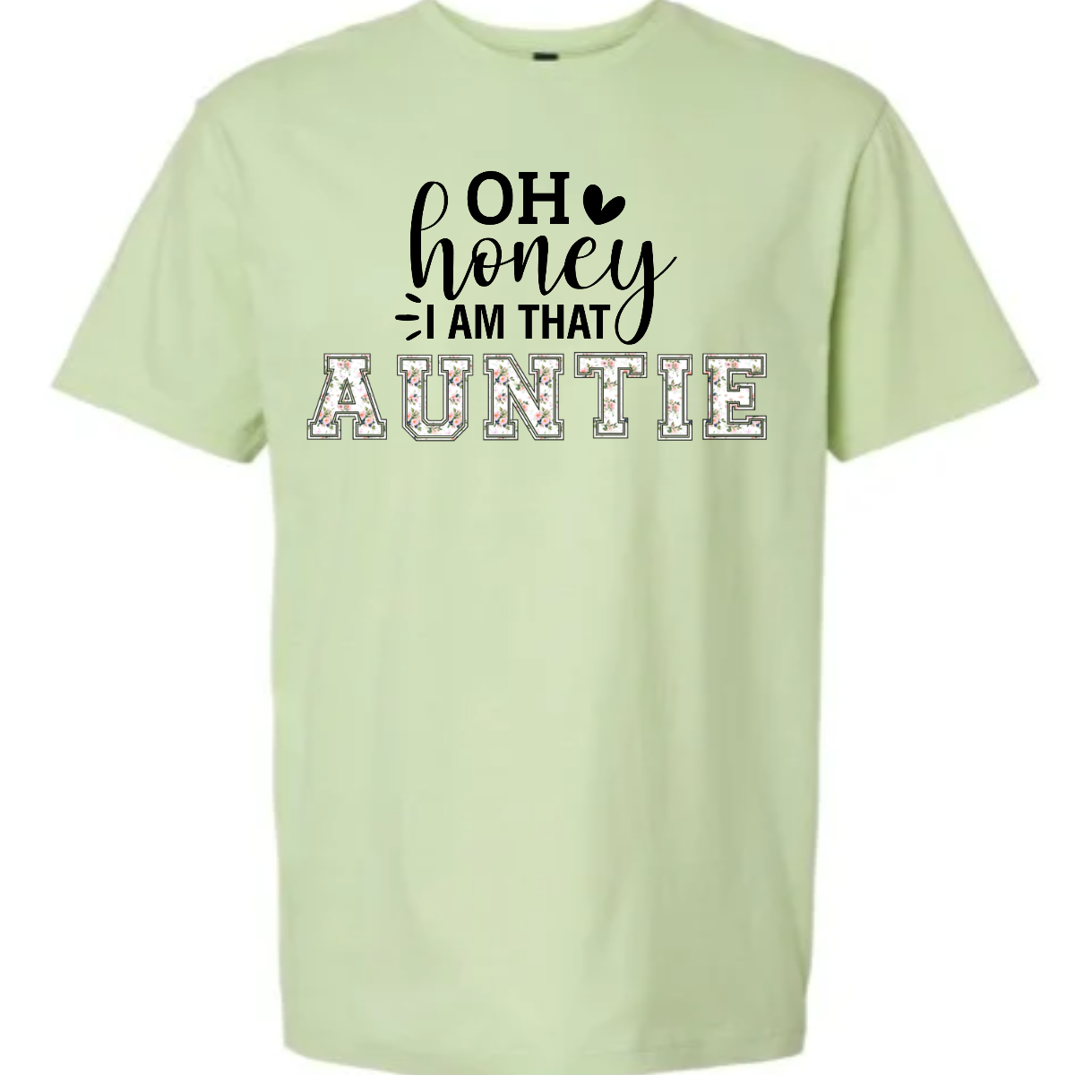 The shirt design features the phrase "Oh Honey, I'm That Auntie" in a playful and eye-catching style. The word "Auntie" is written in bold, bubbly letters filled with intricate floral patterns, giving it a soft and feminine touch. The rest of the phrase uses a mix of fun, whimsical fonts to create a lively and energetic feel. The design is perfect for a stylish and confident auntie who loves to embrace her role with charm and humor. Shop Gorgeouseware.com