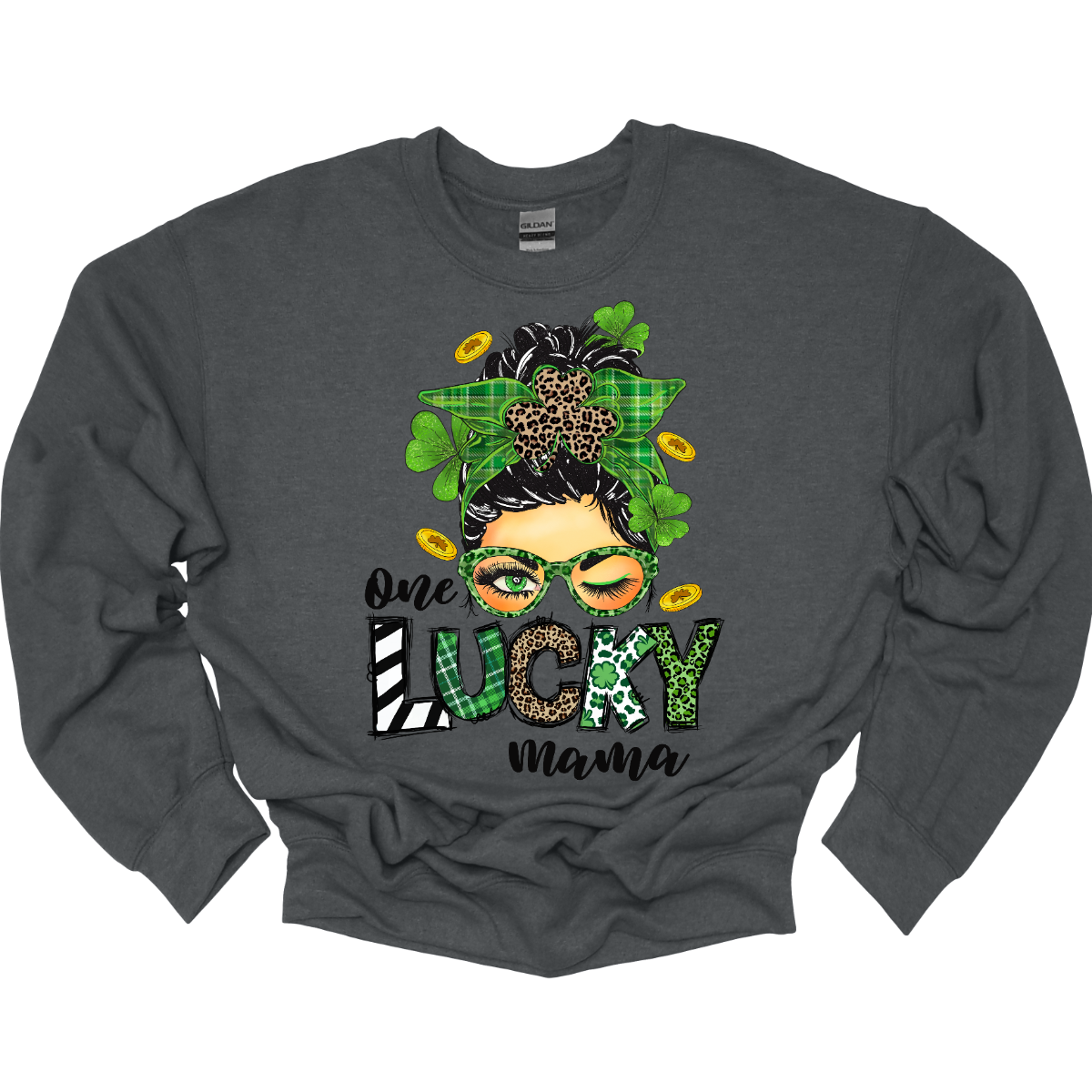 Embrace your mom pride with our charming "One Lucky Mama" T-shirt! This adorable design features a whimsical illustration of a mom sporting a messy updo and trendy green glasses, exuding a fun and carefree vibe. Celebrate the joy of motherhood in style with our "One Lucky Mama" T-shirt. It's a must-have addition to your wardrobe and also makes a thoughtful gift for any proud mama in your life. Wear it with pride and let the world know just how lucky you feel to be a mom! Shop at Gorgeousware.com