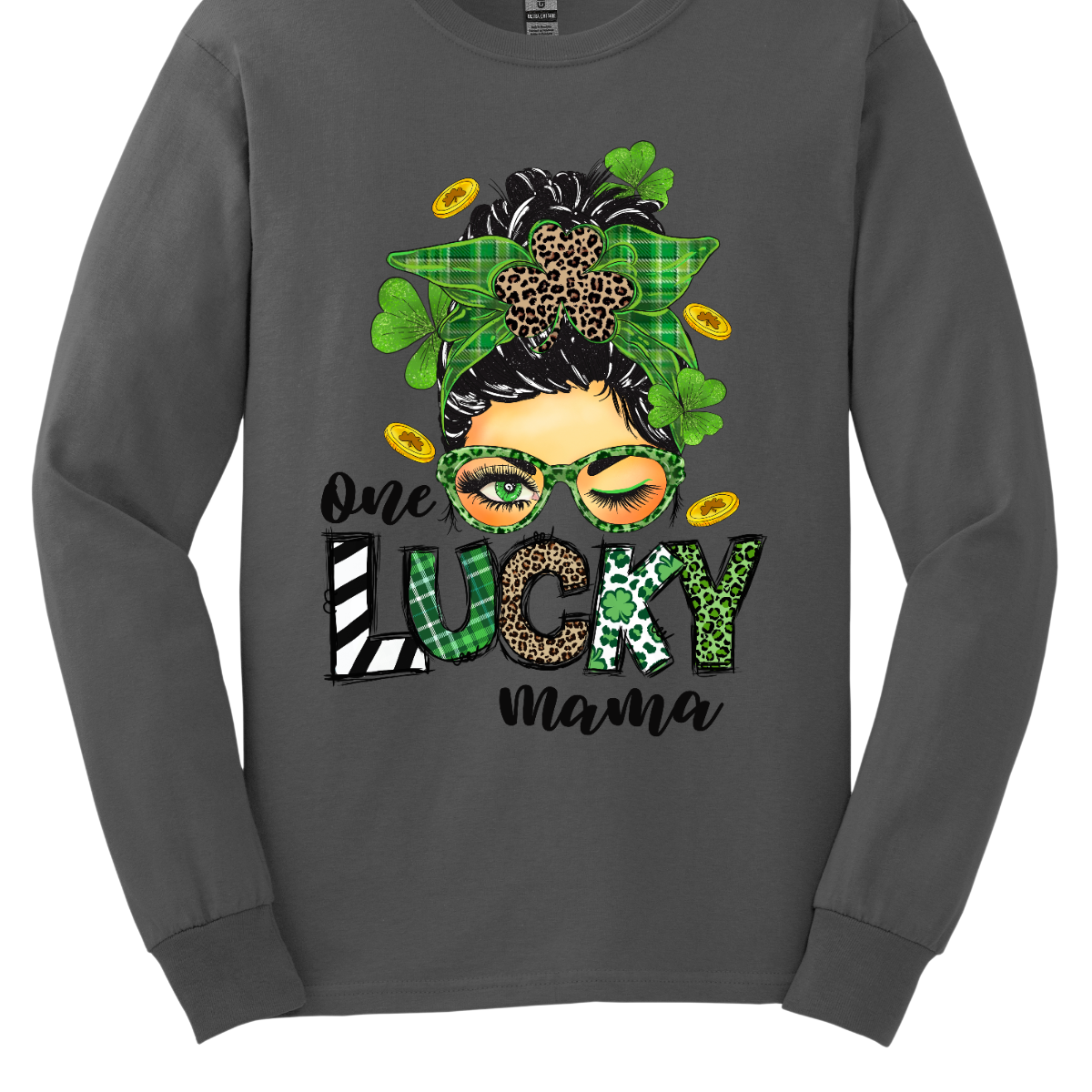Embrace your mom pride with our charming "One Lucky Mama" T-shirt! This adorable design features a whimsical illustration of a mom sporting a messy updo and trendy green glasses, exuding a fun and carefree vibe. Celebrate the joy of motherhood in style with our "One Lucky Mama" T-shirt. It's a must-have addition to your wardrobe and also makes a thoughtful gift for any proud mama in your life. Wear it with pride and let the world know just how lucky you feel to be a mom! Shop at Gorgeousware.com
