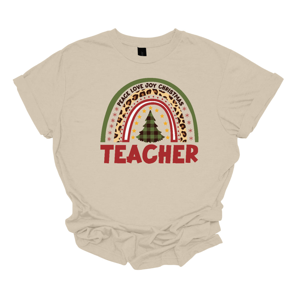 The t-shirt design features a vibrant, patterned rainbow that arcs gracefully across the fabric. Each color of the rainbow is adorned with playful patterns, such as polka dots, snowflakes, and cheetah print, adding a whimsical touch. At the center of the rainbow stands a beautifully illustrated Christmas tree. Shop at orgeousware.com