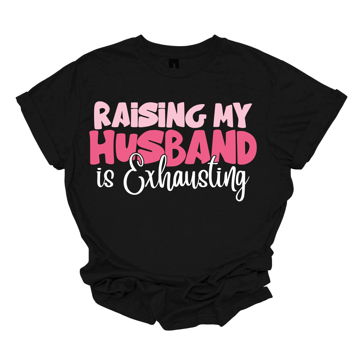 This T-shirt features the humorous phrase "Raising My Husband Is Exhausting" prominently across the chest. The text is creatively arranged in a mix of playful and quirky fonts, each each line standing out with a unique style. The color palette is a soft and vibrant pink, with a varying shade to enhance the fun and lighthearted vibe of the design. Shop at Gorgeousware.com