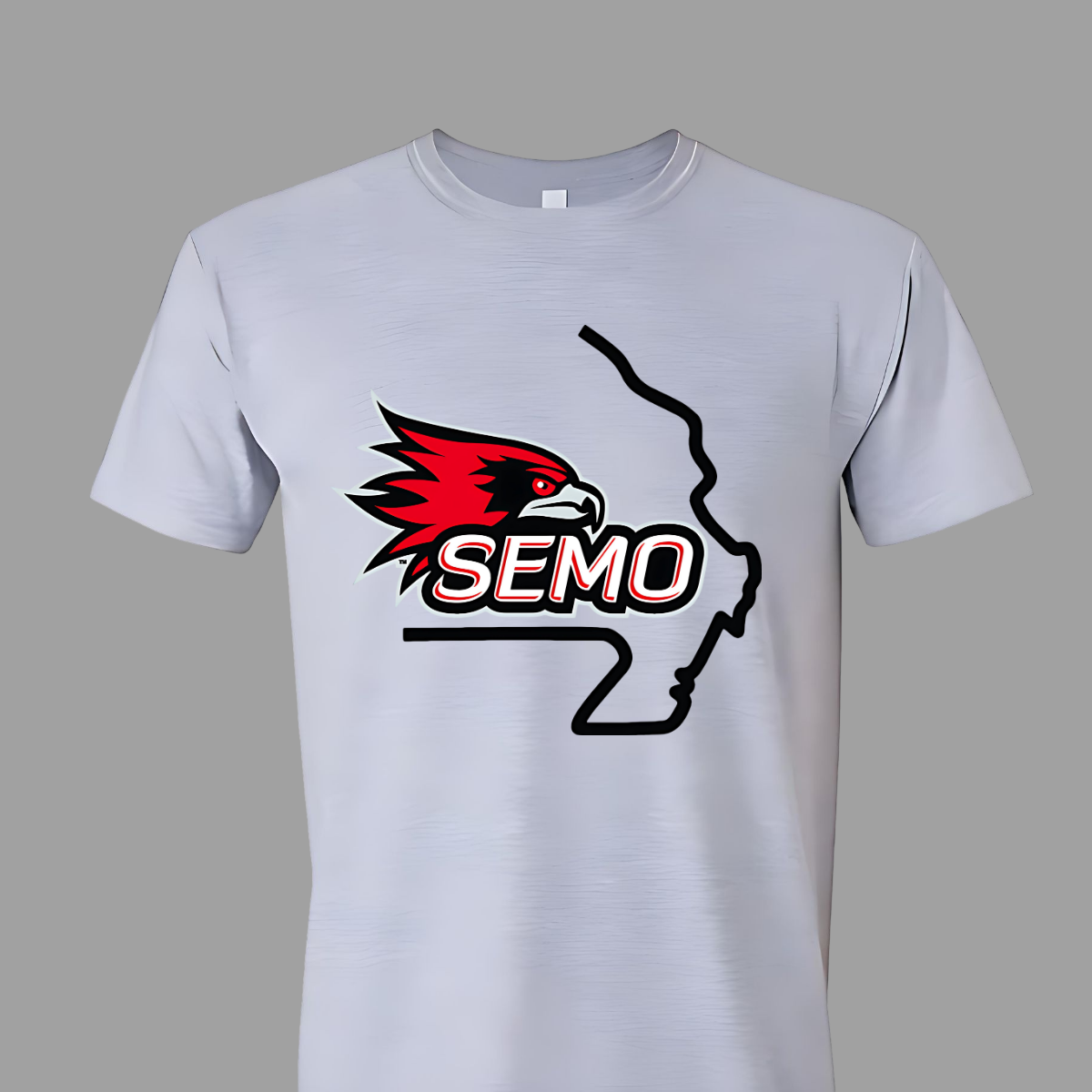 This striking t-shirt features a bold red hawk design at the center, capturing the spirit and fierceness of this majestic bird. Below the hawk, the word "SEMO" pops in vibrant bubble letters, adding a playful touch that complements the overall design. Perfect for fans of Southeast Missouri State University or anyone who loves unique, eye-catching apparel.  Shop at Gorgeousware.com