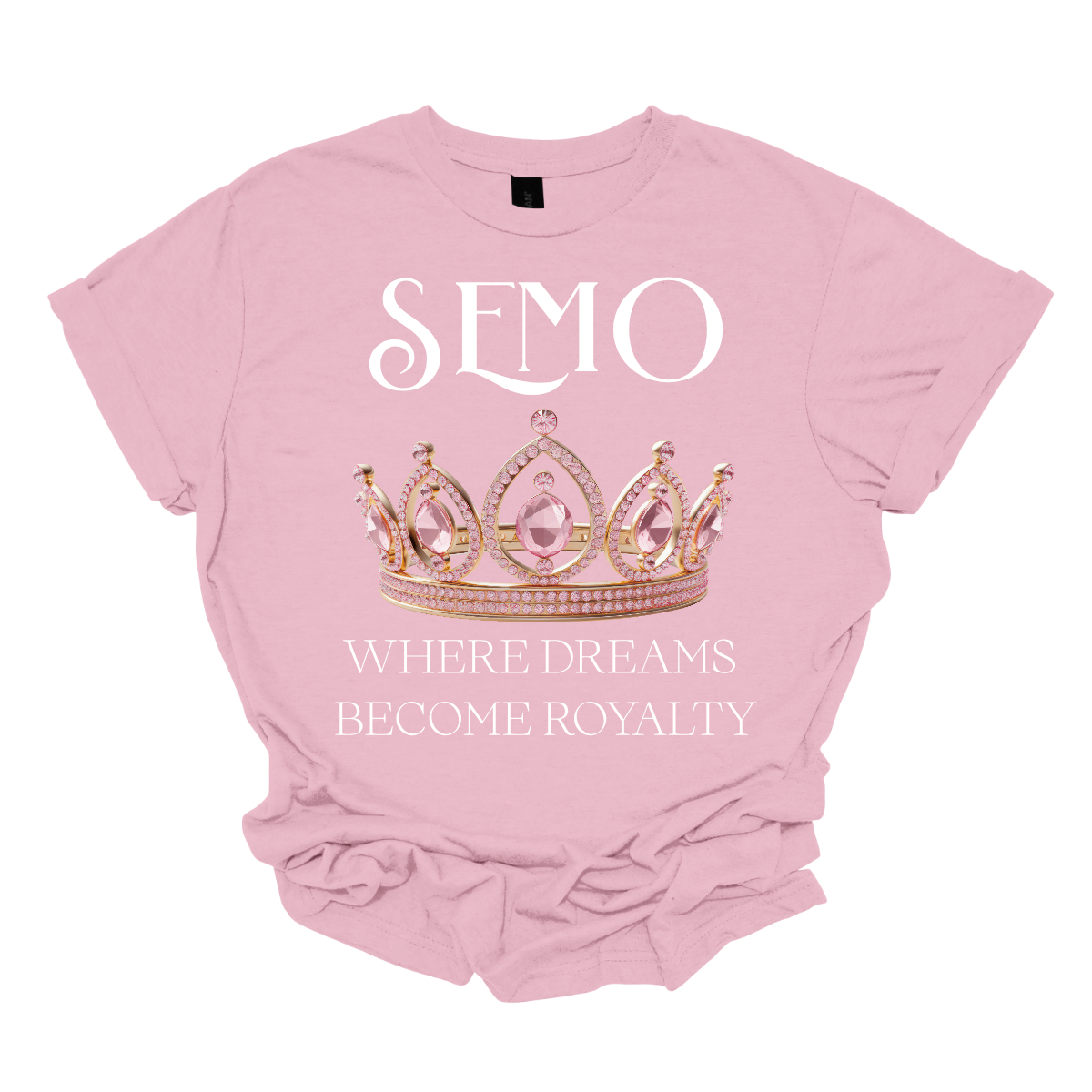 Light pink t-shirt with a crown graphic and text on a white background that says "SEMO - Where dreams become royalty". Shop at Gorgeousware.com