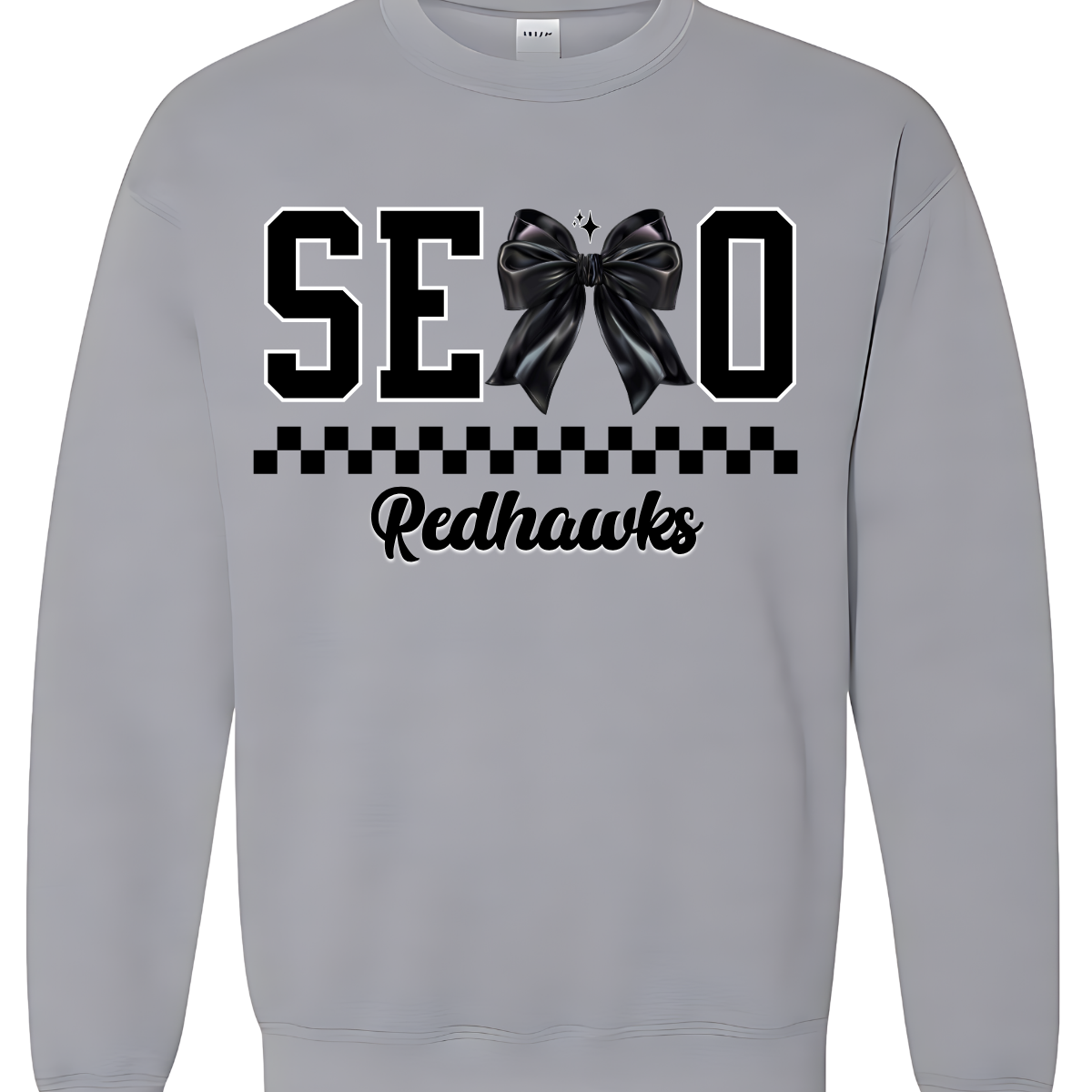 Show off your SEMO pride in style with this trendy creneck and hoodie! Featuring the bold letters "SEMO," where the "M" is cleverly replaced by a stylish black croquette bow, this shirt adds a unique twist to your wardrobe. Underneath, a playful checkerboard stripe adds a fun touch, while "Redhawks" is elegantly written in a cute cursive font, bringing a touch of flair. Shop at Gorgeousware.com