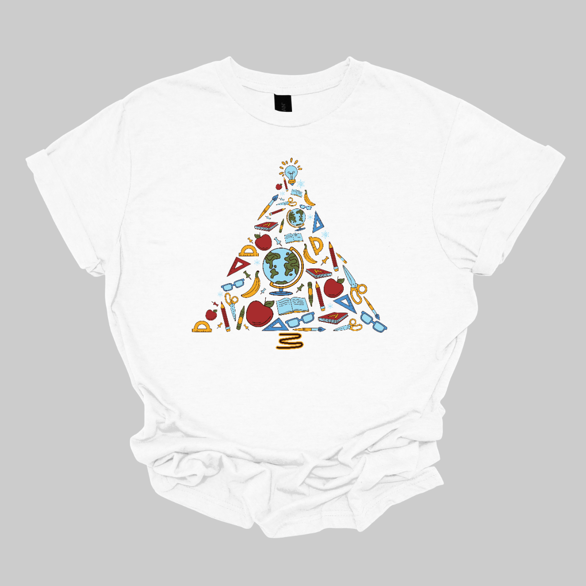 This creative t-shirt design features a festive Christmas tree composed entirely of colorful school supplies. Pencils, rulers, markers, and notebooks, and other school supplies form the branches adding a playful touch. The vibrant colors and unique arrangement create a fun and engaging visual, perfect for educators and students alike. Made from soft, comfortable fabric, this t-shirt is an ideal way to celebrate the holiday season while showcasing a love for learning!! Shop at Gorgeousware.com