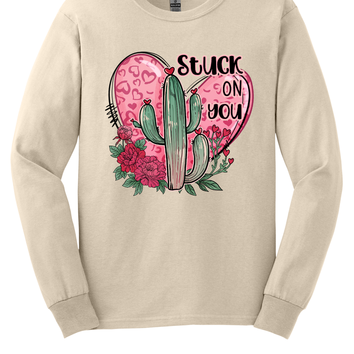 Introducing our "Stuck On You" T-shirt – a playful and charming garment that beautifully blends romance with a touch of desert whimsy. This shirt features an endearing heart entwined with a cactus, creating a delightful design that captures the essence of love with a hint of humor. Shop at Gorgeousware.com