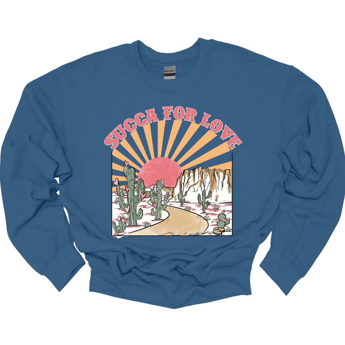 Declare your affection with our "Succa for Love" T-shirt – a playful and heartwarming garment that beautifully combines a clever phrase with the serene beauty of cactuses and a sunrise or sunset. Perfect for those who appreciate a unique and charming expression of love inspired by the beauty of the desert. Shop at Gorgeousware.com