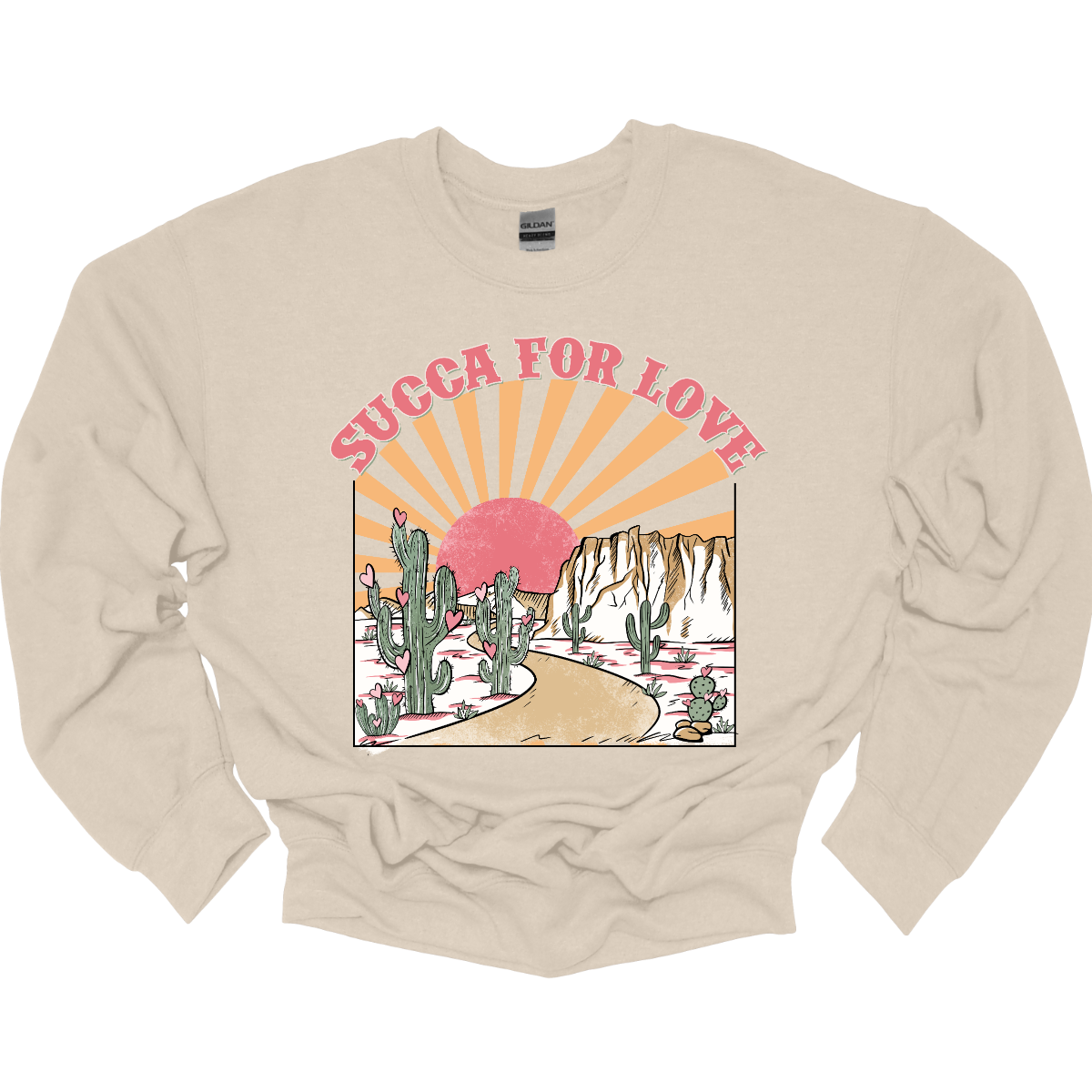 Declare your affection with our "Succa for Love" T-shirt – a playful and heartwarming garment that beautifully combines a clever phrase with the serene beauty of cactuses and a sunrise or sunset. Perfect for those who appreciate a unique and charming expression of love inspired by the beauty of the desert. Shop at Gorgeousware.com