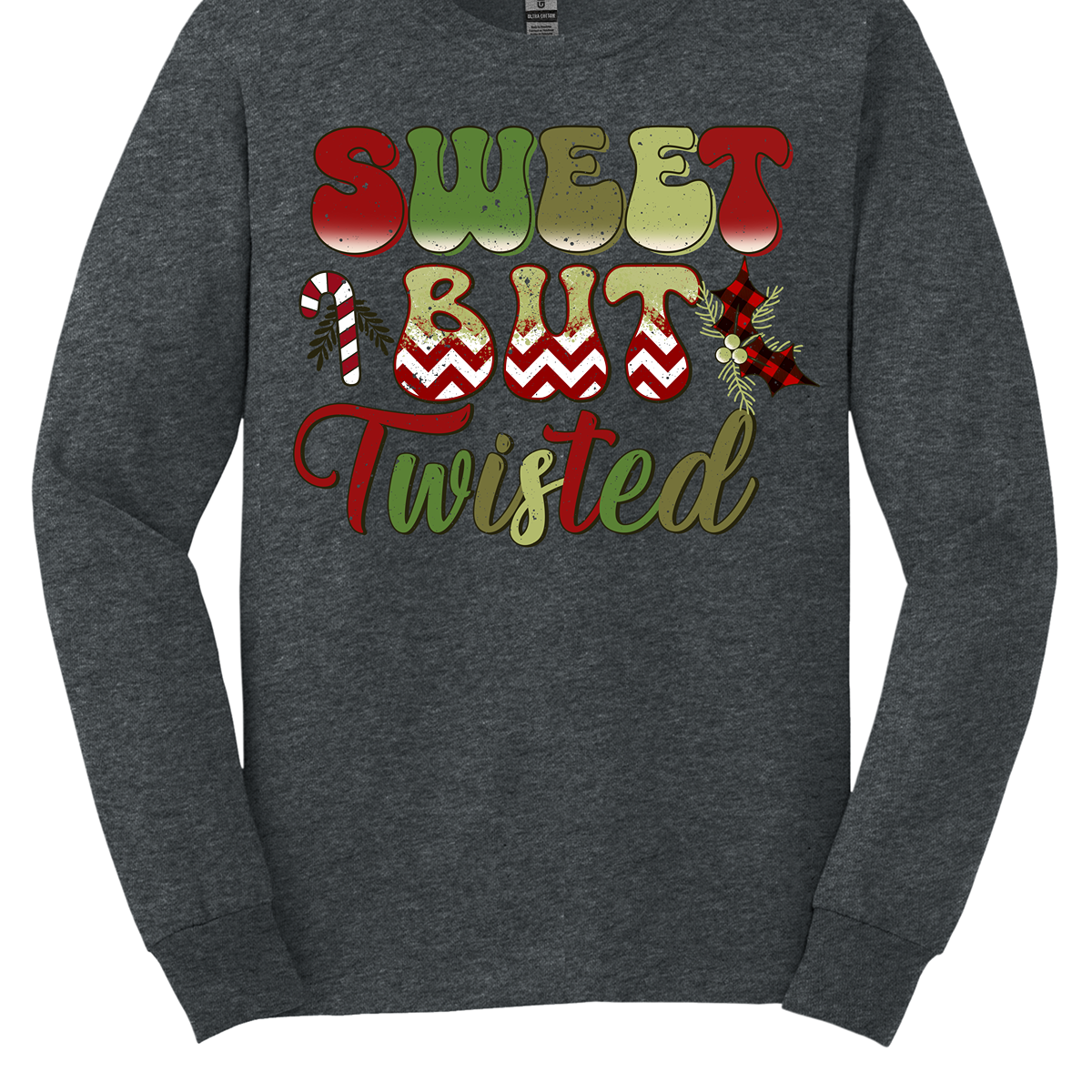 The apparel features a playful and bold design with the phrase "Sweet but Twisted" prominently displayed in large bubble letters. The letters are vibrant, with shades of green and red, creating a fun, festive contrast. The word "but" stands out, with its bottom edges filled with a red and white chevron pattern, adding a striking visual detail. Shop at Gorgeousware.com