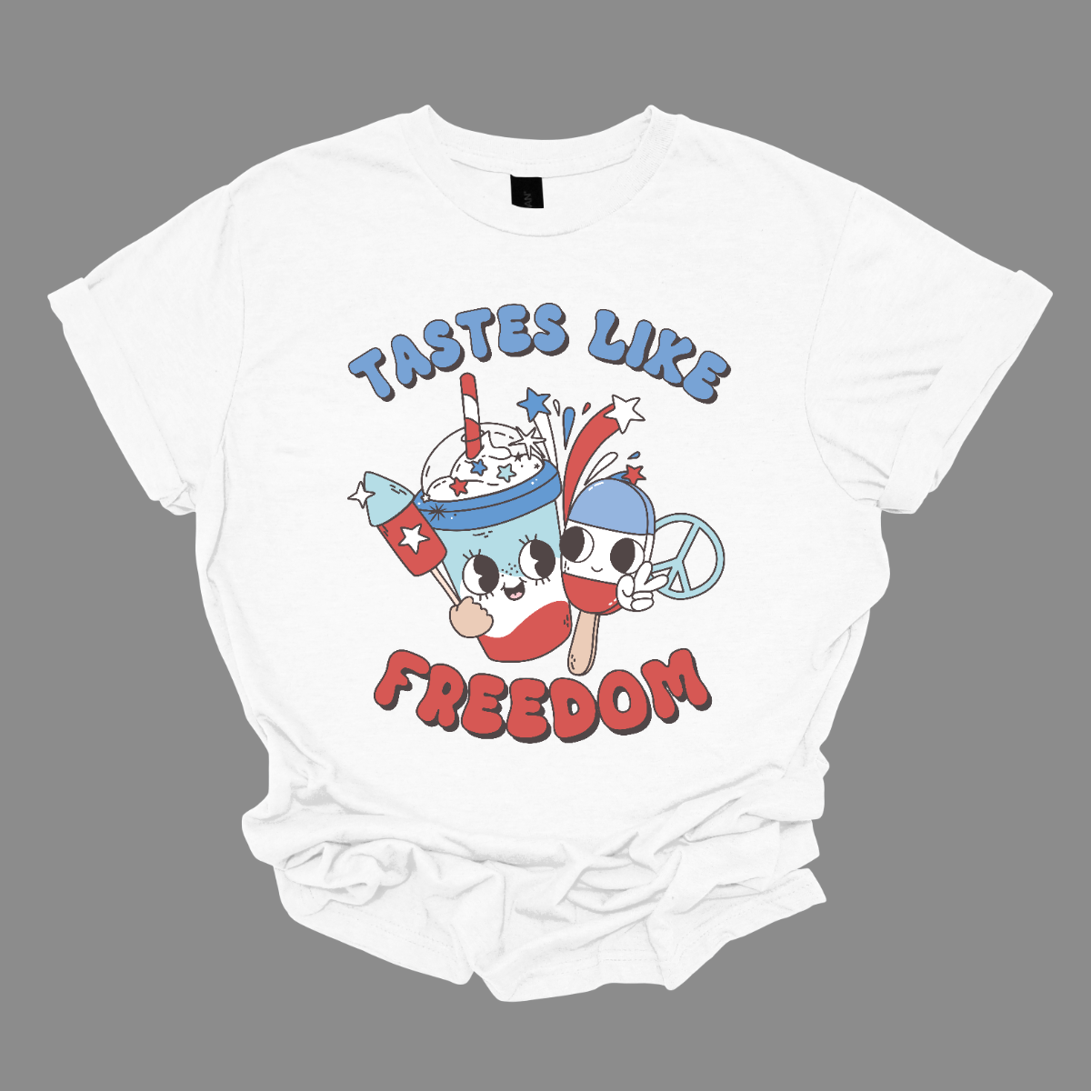 The design titled "Tastes Like Freedom" captures the essence of American patriotism and fun summer vibes. The phrase "Tastes Like Freedom" is displayed in bold, playful lettering with a red, white, and blue color scheme, evoking the colors of the American flag. 
In the picture, a Bomb Pop, a peace sign, firework, and cool drink symbolizing childhood memories and summer enjoyment. Shop Gorgeousware.com