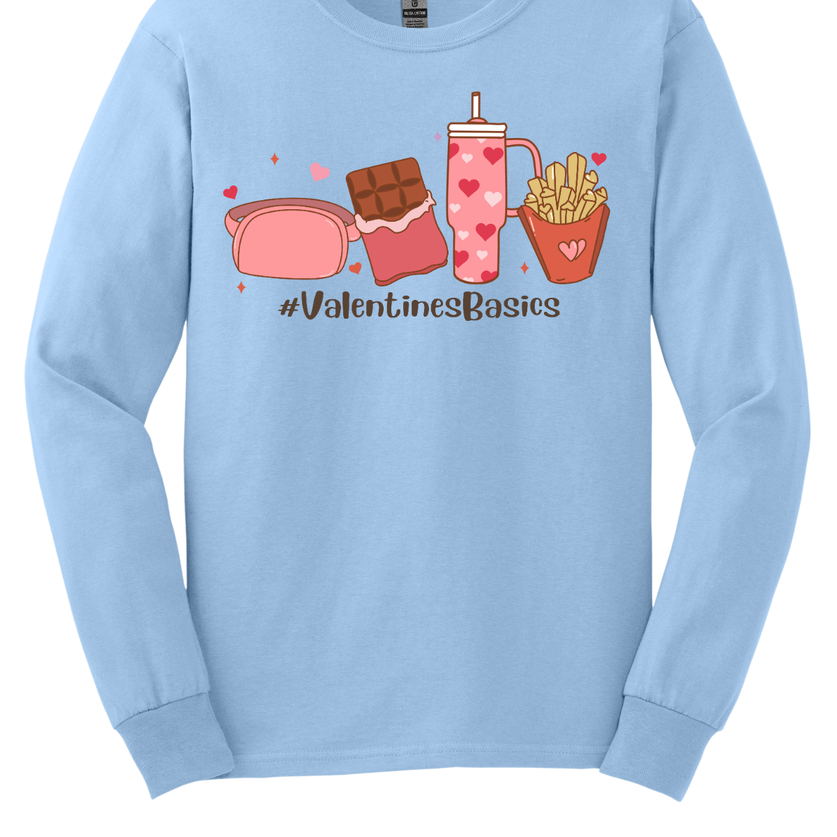 Introducing our "#ValentineBasics" T-shirt – a stylish and playful ensemble that captures the essence of Valentine's Day with a touch of everyday essentials. This shirt is a trendy celebration of the things that make this romantic holiday uniquely delightful. The design features the hashtag "#ValentineBasics" displayed prominently, complemented by illustrations of a Lululemon shoulder bag, a box of chocolates, the iconic Stanley Cup, and a side of fries. Shop at Gorgeousware.com