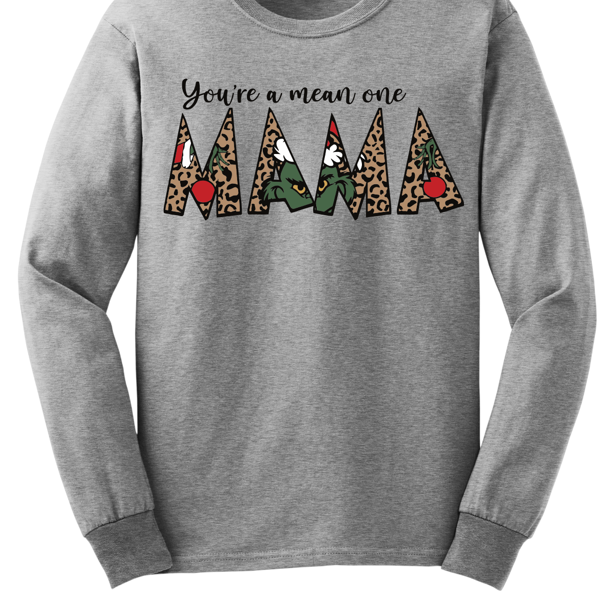 The phrase "You're a Mean One Mama" takes center stage, with "You're a Mean One" written in elegant black cursive font that flows beautifully across the fabric. The standout element is the word "Mama," which is rendered in bold, eye-catching letters. Each letter of "Mama" is filled with a quirky depiction of the Grinch, set against a vibrant cheetah print background. Shop Gorgeousware.com