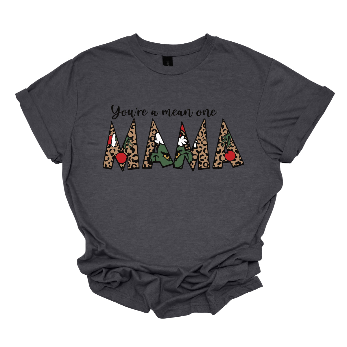 The phrase "You're a Mean One Mama" takes center stage, with "You're a Mean One" written in elegant black cursive font that flows beautifully across the fabric. The standout element is the word "Mama," which is rendered in bold, eye-catching letters. Each letter of "Mama" is filled with a quirky depiction of the Grinch, set against a vibrant cheetah print background. Shop Gorgeousware.com