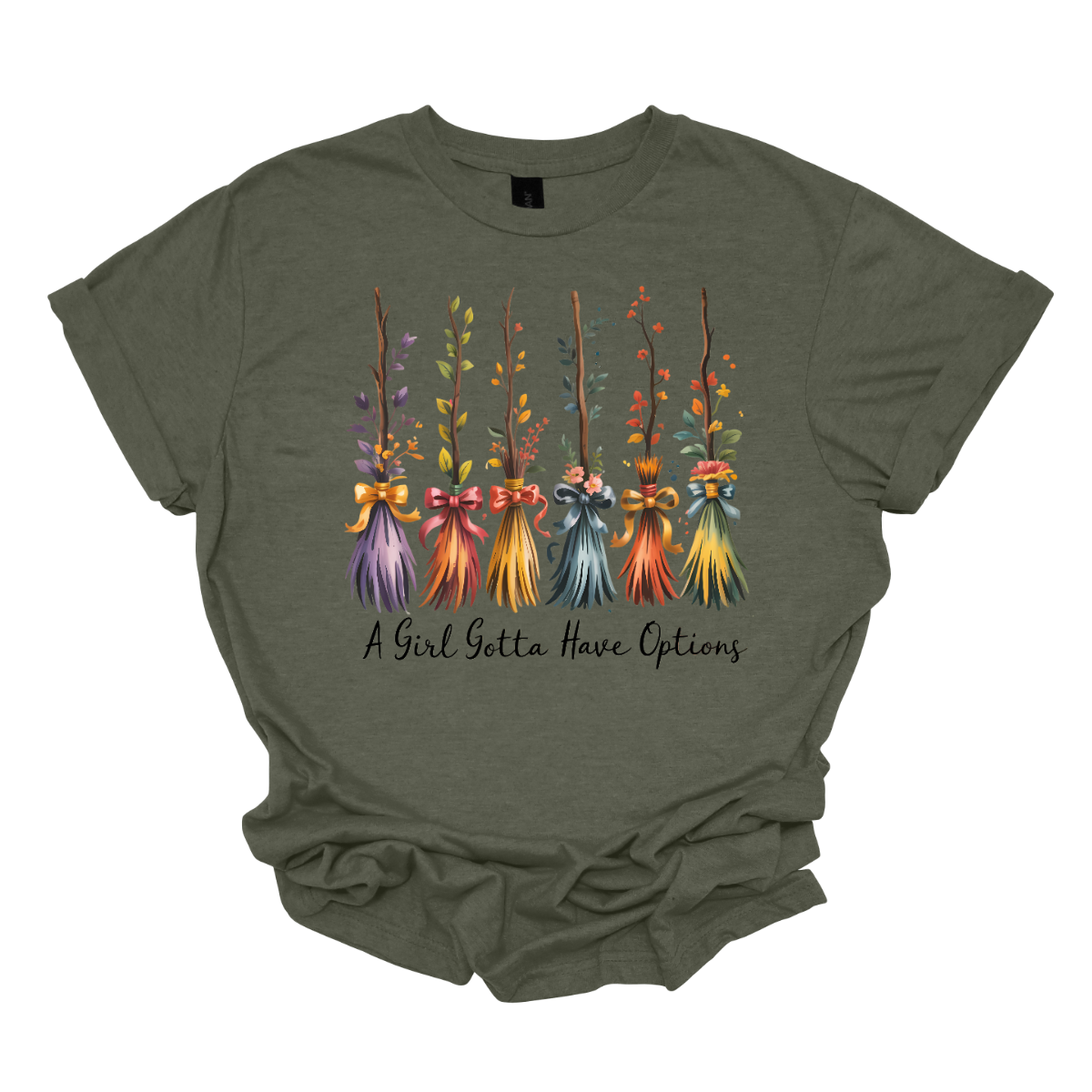 Add a little magic to your fall wardrobe with this fun and whimsical Halloween-inspired tee! The design features six wispy brooms lined up in playful autumn colors, each with its own unique charm. Beneath them, the phrase “A Girl Gotta Have Options” is written, making this shirt a cheeky and stylish nod to witchy fall vibes. Shop at Gorgeousware.com