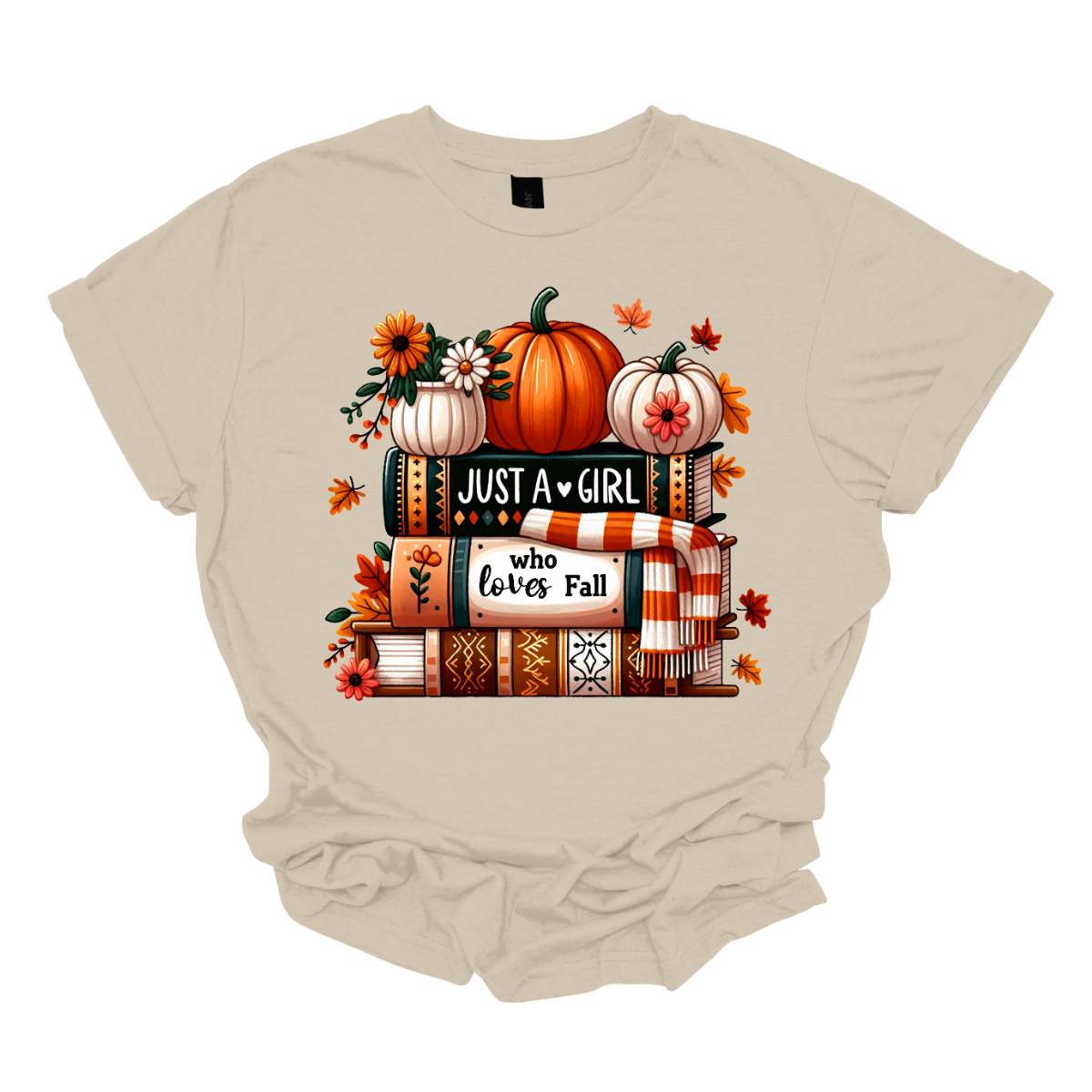 Bring cozy fall vibes to your wardrobe with this autumn-inspired graphic tee! The design features two pumpkins and a small pot of flowers perched on a stack of books with the spines reading “Just a Girl” and “Who Loves Fall.” An orange-and-white scarf wraps around the books while leaves gently fall, creating the perfect scene for autumn lovers. Shop at Gorgeousware.com