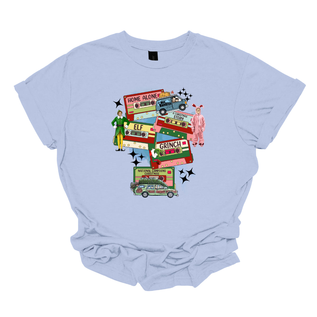 This design t-shirt showcases a nostalgic tribute to classic Christmas movies with a vibrant design featuring beloved characters. Each movie is represented by a unique cartoon illustration Home Alone, A Christmas Story, Elf, The Grinch, and Christmas Vacation. The colorful illustrations are framed by cassette tapes, adding a retro touch that evokes warm memories of holiday movie marathons. Shop Gorgeousware.com