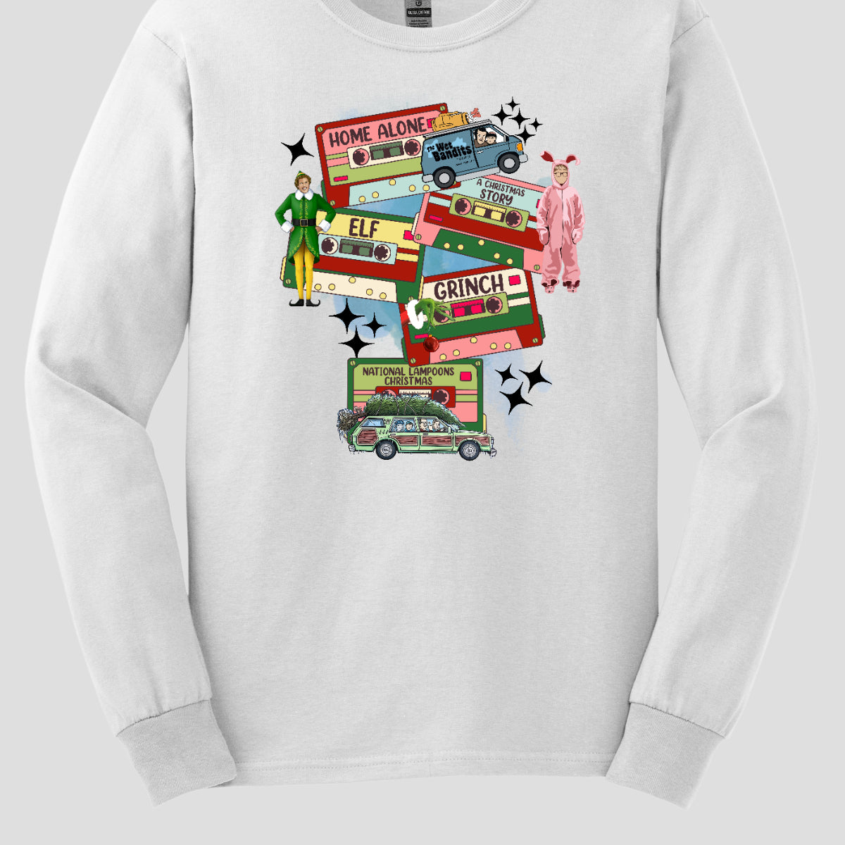 This design t-shirt showcases a nostalgic tribute to classic Christmas movies with a vibrant design featuring beloved characters. Each movie is represented by a unique cartoon illustration Home Alone, A Christmas Story, Elf, The Grinch, and Christmas Vacation. The colorful illustrations are framed by cassette tapes, adding a retro touch that evokes warm memories of holiday movie marathons. Shop Gorgeousware.com