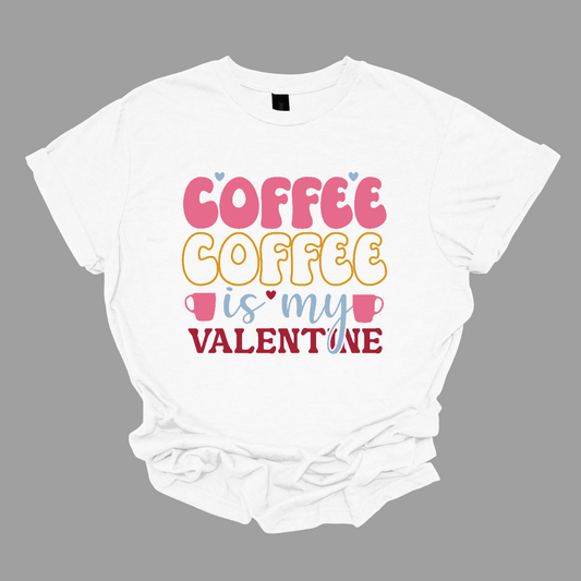 Sip, savor, and celebrate love with our 'Coffee Coffee is My Valentine' T-shirt, adorned with delightful coffee cups. This tee is a homage to the truest of loves – the rich and comforting embrace of coffee. The charming coffee cups add a touch of caffeinated charm to the design, making it the perfect shirt for those who find joy in every cup.