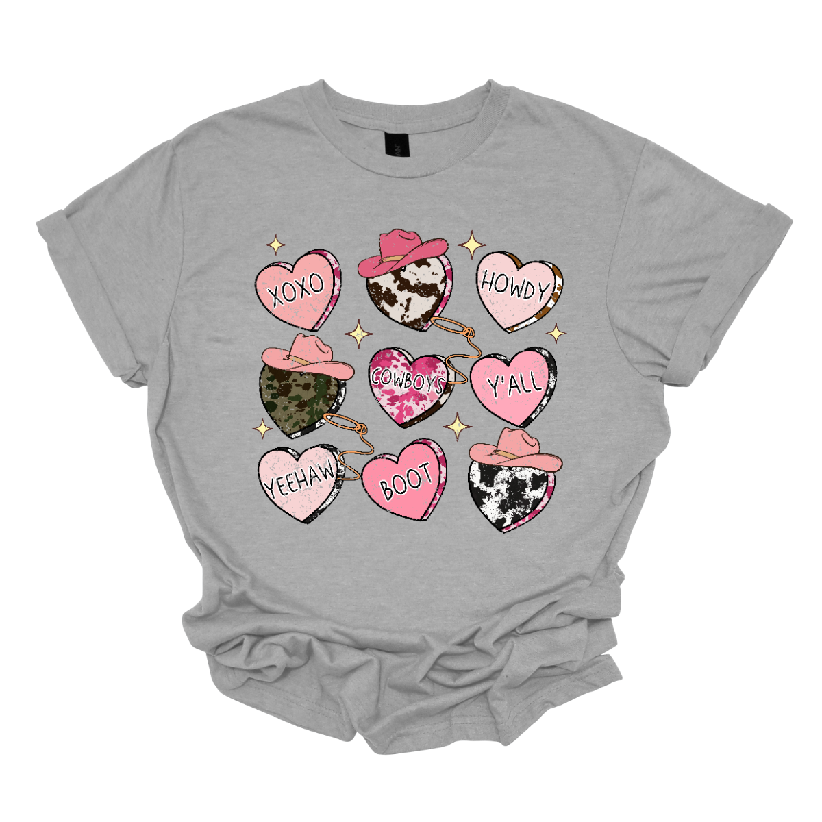 Introducing our "Country Conversation" Valentine's T-shirt – a delightful blend of rustic charm and heartfelt expressions. This shirt features a unique design adorned with hearts that incorporate lassos and cowgirl hats, creating a warm and Western-inspired atmosphere perfect for celebrating love in true country style. The hearts on the shirt are creatively crafted with lassos encircling them, symbolizing the timeless act of roping in affection. Shop at Gorgeousware.com