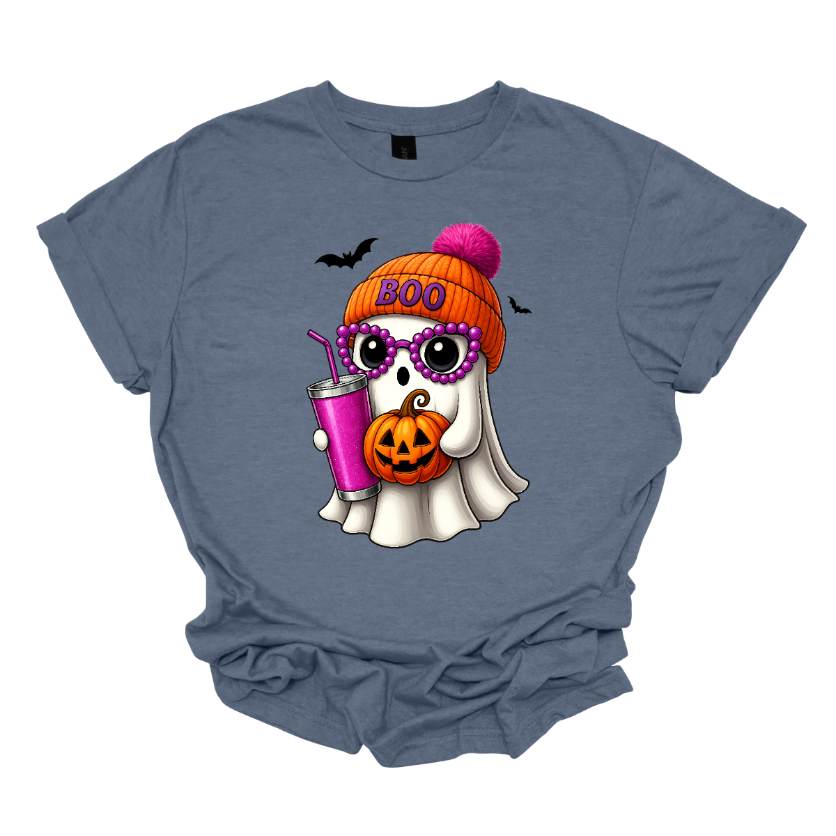 Bring on the spooky-cute vibes with this adorable fall tee! 👻🎃 The design features a sweet little ghost bundled up in an orange sock cap with a pink pom on top. The flipped brim of the hat reads “BOO” for a playful touch. This stylish ghost also sports purple reading glasses, holds a matching purple drink cup, and carries a tiny jack-o’-lantern bucket — ready for all the fall fun! Two little bats flutter in the background to complete the whimsical Halloween scene. Gorgeousware.com