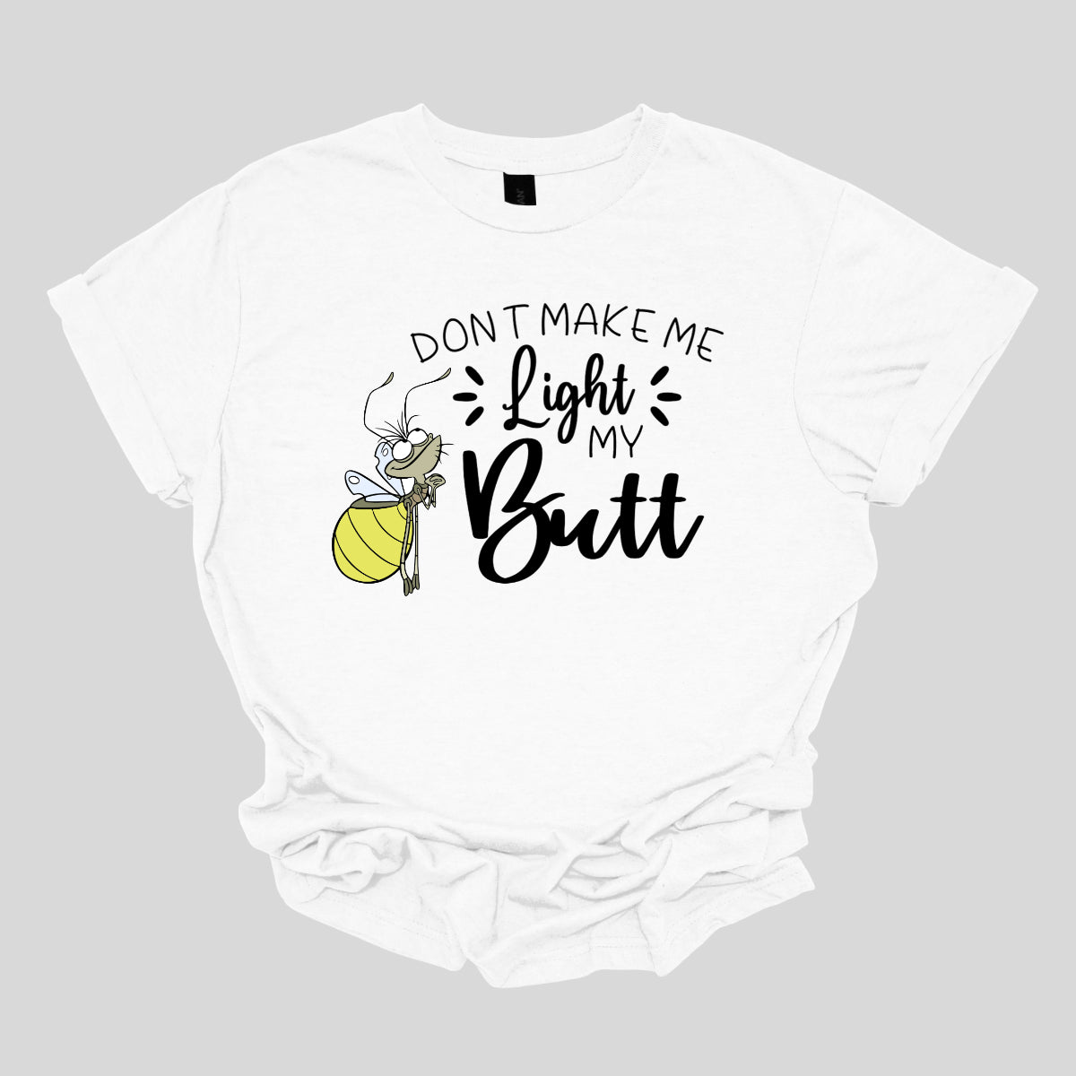 Light My Butt." The words "Don't Make Me" and "My" are rendered in a whimsical stick figure font, adding a fun, hand-drawn feel. In contrast, the words "Light" and "Butt" are highlighted in a bold, flowing cursive font, making them stand out with a touch of flair. Shop Gorgeousware.com