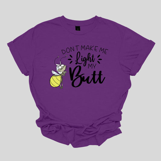 Light My Butt." The words "Don't Make Me" and "My" are rendered in a whimsical stick figure font, adding a fun, hand-drawn feel. In contrast, the words "Light" and "Butt" are highlighted in a bold, flowing cursive font, making them stand out with a touch of flair. Shop Gorgeousware.com