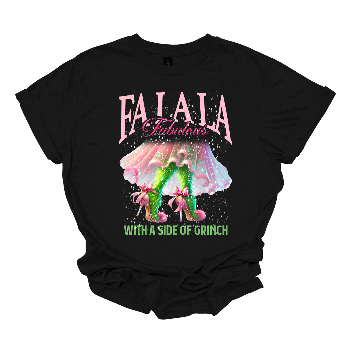 The design features a playful and festive take on the Grinch character with a stylish twist. The phrase "Fa La La Fabulous" is at the top in a fun, cursive font with a bouncy, holiday-inspired feel. The word "Fabulous" stands out in bold, glamorous lettering with subtle sparkles, giving it a chic vibe. Below, the Grinch is shown with her girly green legs, styled in light pink high heels adorned with oversized bows at the back, adding a sweet and fashionable touch. Shop at Gorgeousware.com