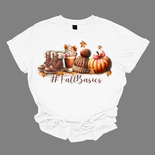 Introducing our cozy #fallbasics t-shirt, perfect for embracing the spirit of the season! This delightful design features a charming illustration at the top, showcasing fuzzy fall boots, a warm autumn drink, a stylish sock cap, and a cheerful pumpkin surrounded by playful leaves blowing in the breeze. Shop at Gorgeousware.com