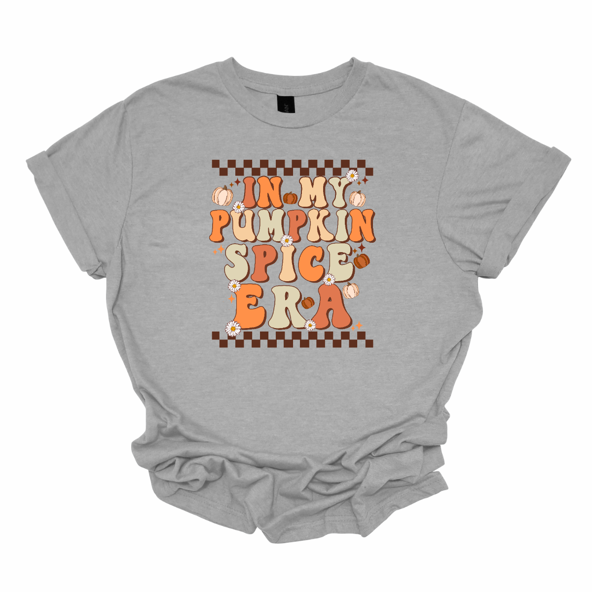 The t-shirt features a vibrant, retro-inspired design with the phrase "In My Pumpkin Spice Era" prominently displayed across the front. The text is rendered in a nostalgic, vintage-style font with an autumnal color palette. The letters are adorned in various shades of orange and yellow, with accents of green, evoking the warmth and richness of the fall season. Shop Gorgepusware.com