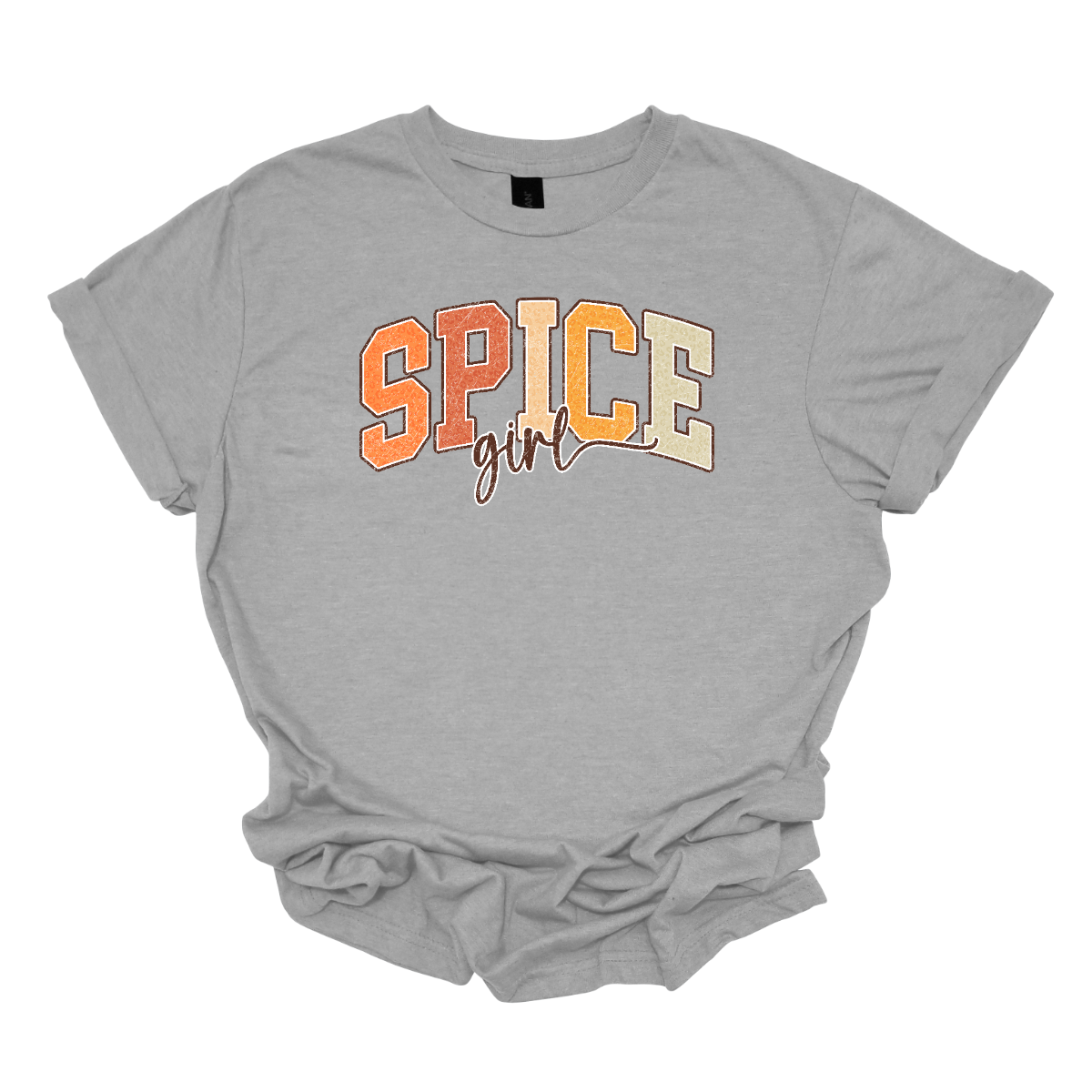 The t-shirt features the phrase "Spice Girl" in a visually striking layout. The word "Spice" is prominently displayed in big, bold retro-style letters. The letters are adorned in varying shades of orange, that captures the warmth and vibrancy of autumn. Beneath "Spice," the word "Girl" is elegantly styled in a smaller, flowing cursive font. Shop Gorgeousware.com