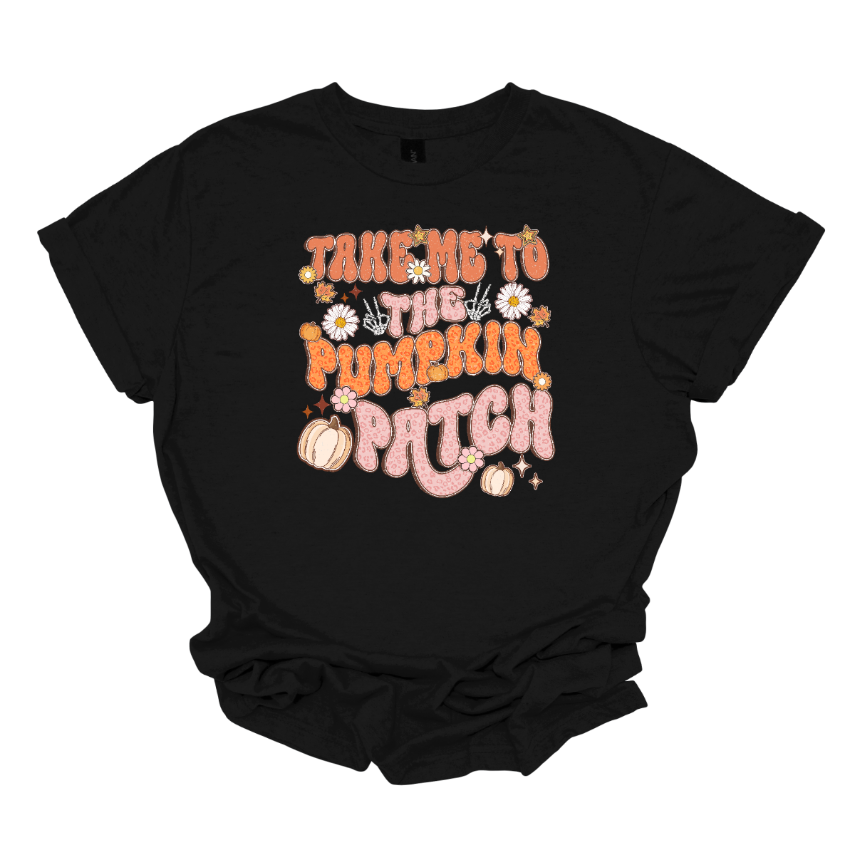 The t-shirt design features the playful phrase "Take Me to the Pumpkin Patch" in a stylish retro font. The text is rendered in a delightful combination of orange and pink pastel cheetah print, giving it a trendy and eye-catching look with a touch of whimsy. Shop Gorgousware.com