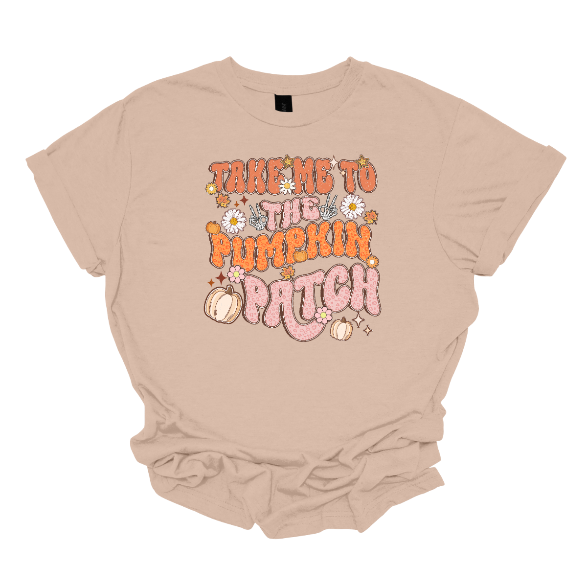 The t-shirt design features the playful phrase "Take Me to the Pumpkin Patch" in a stylish retro font. The text is rendered in a delightful combination of orange and pink pastel cheetah print, giving it a trendy and eye-catching look with a touch of whimsy. Shop Gorgousware.com