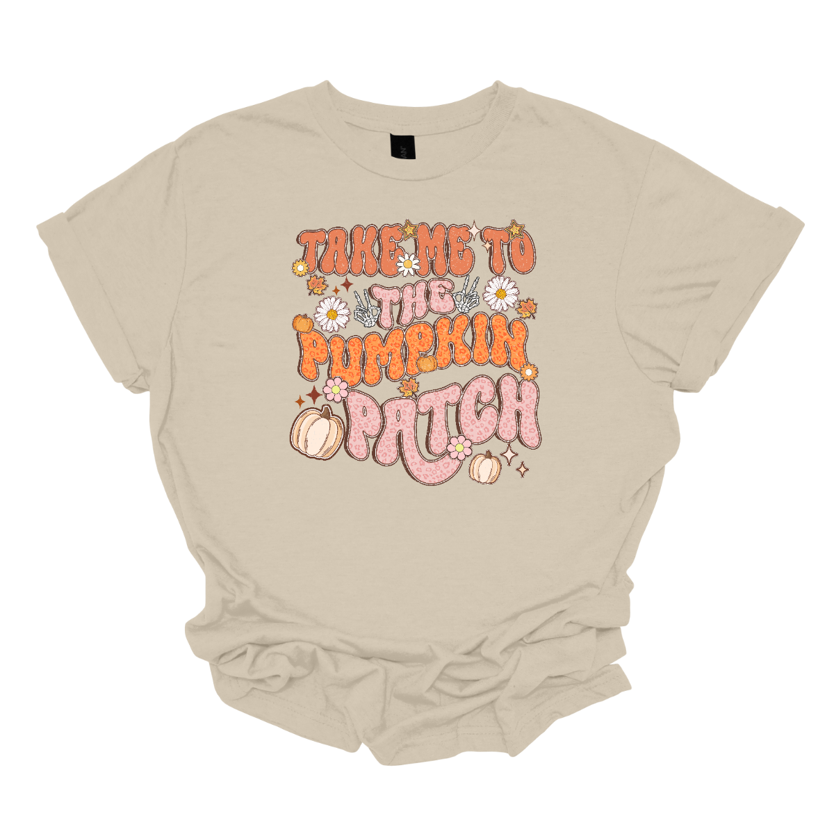 The t-shirt design features the playful phrase "Take Me to the Pumpkin Patch" in a stylish retro font. The text is rendered in a delightful combination of orange and pink pastel cheetah print, giving it a trendy and eye-catching look with a touch of whimsy. Shop Gorgousware.com