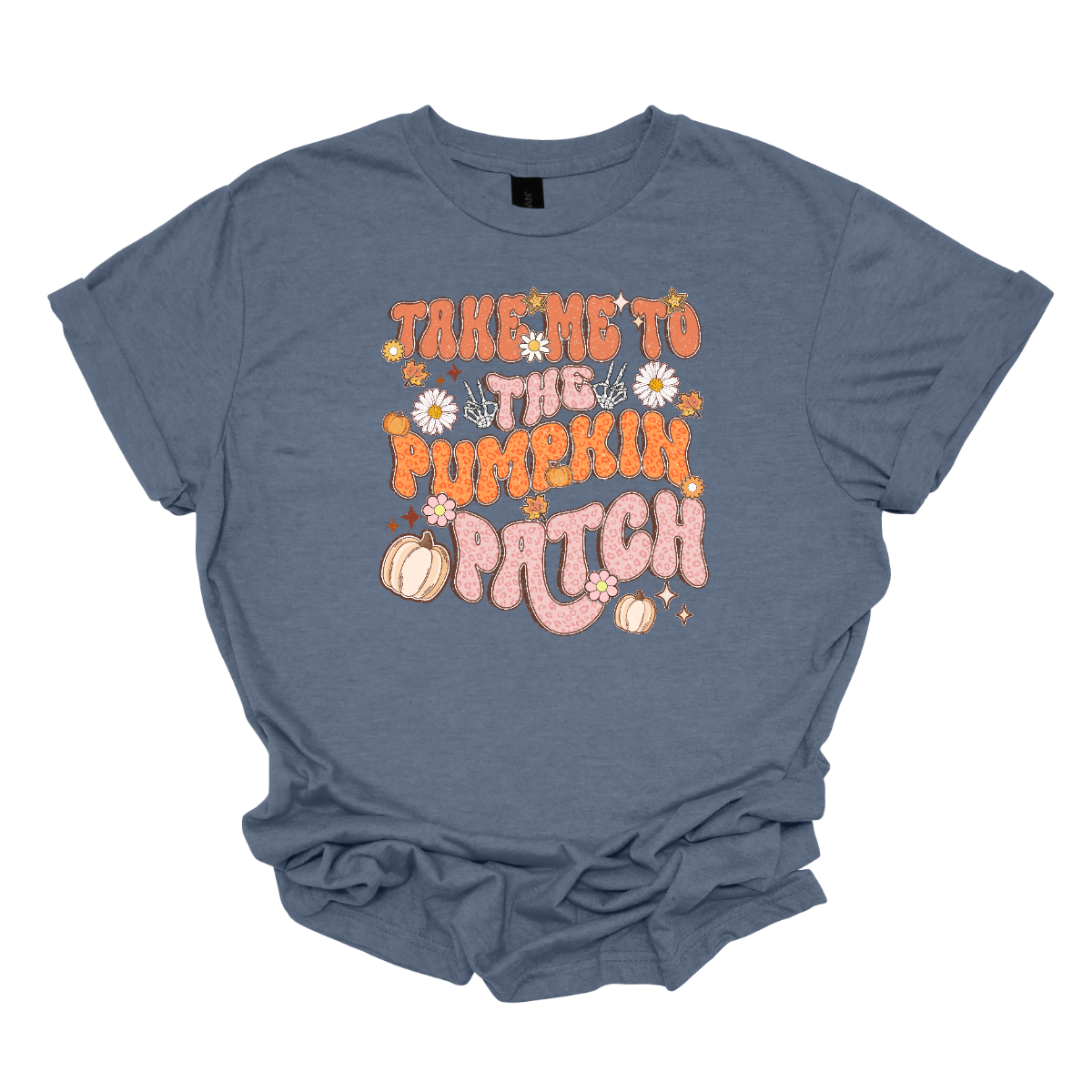 The t-shirt design features the playful phrase "Take Me to the Pumpkin Patch" in a stylish retro font. The text is rendered in a delightful combination of orange and pink pastel cheetah print, giving it a trendy and eye-catching look with a touch of whimsy. Shop Gorgousware.com