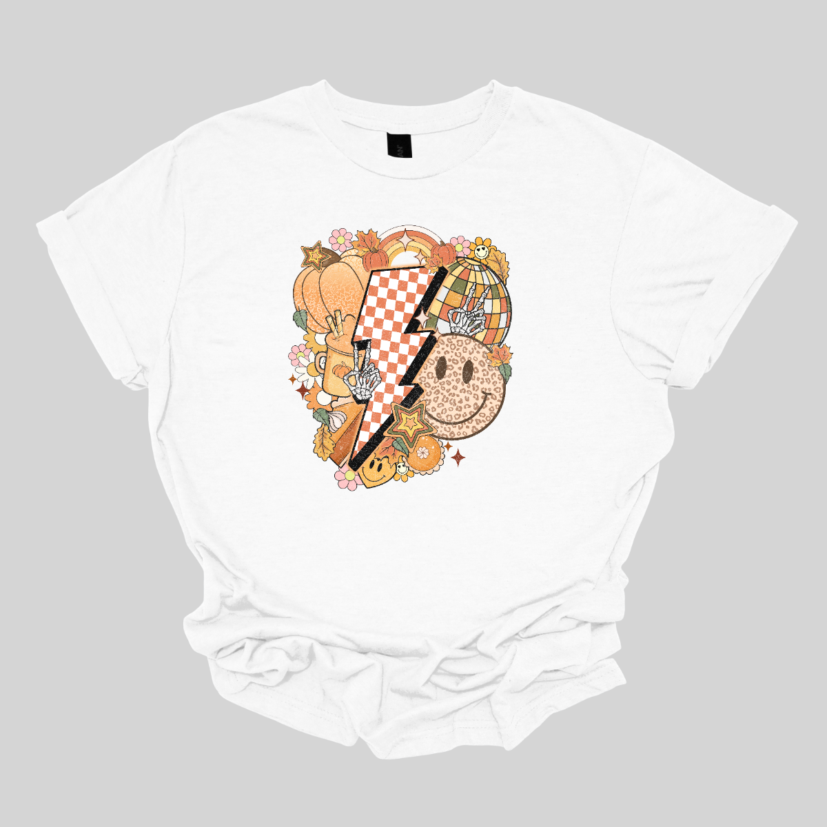 This t-shirt is a vibrant, retro-inspired celebration of eclectic autumn vibes. At its center is a bold, large lightning bolt styled in a striking pink and white checkerboard pattern, immediately capturing attention with its energetic and nostalgic flair.  Shop Gorgeousware.com