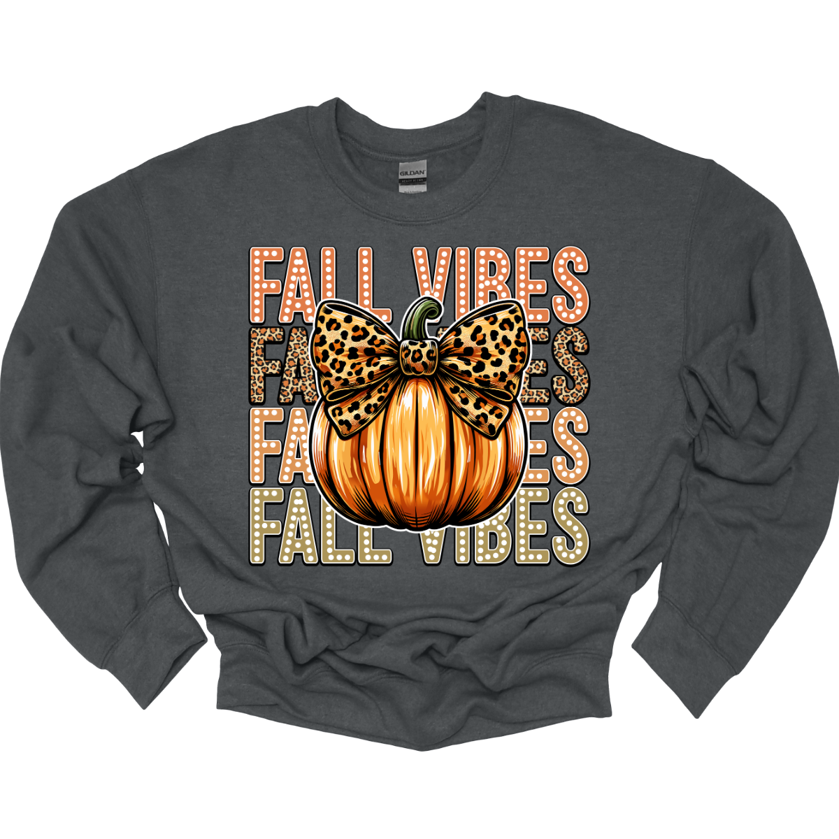 Embrace the cozy charm of autumn with our "Fall Designs" t-shirt! This playful design features the phrase "Fall Designs" stacked vertically, with vibrant fall colors bringing each letter to life in a charming white dot font. At the heart of the design, a whimsical pumpkin with a cute cheetah print bow adds a touch of playful flair. Shop at Gorgeousware.com