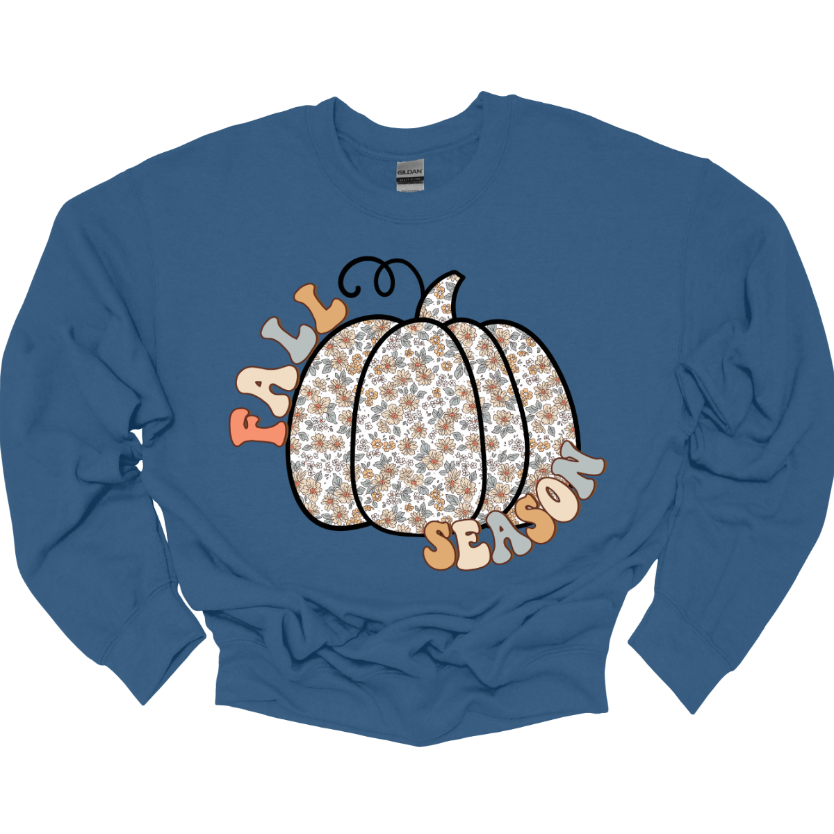 Celebrate the beauty of autumn with our "Fall Season" t-shirt! This enchanting design features the words "Fall Season" in a stylish, easy-to-read font, perfectly complemented by a unique pumpkin illustration. The pumpkin is adorned with a soft floral pattern, blending seasonal charm with a touch of whimsical elegance.  Shop at Gorgeousware.com