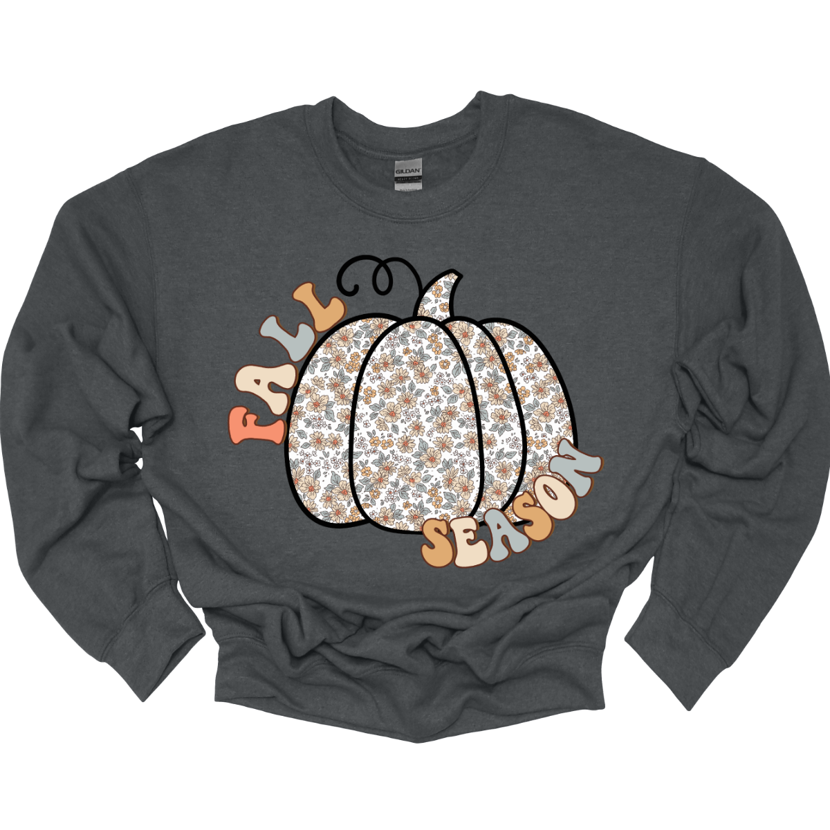 Celebrate the beauty of autumn with our "Fall Season" t-shirt! This enchanting design features the words "Fall Season" in a stylish, easy-to-read font, perfectly complemented by a unique pumpkin illustration. The pumpkin is adorned with a soft floral pattern, blending seasonal charm with a touch of whimsical elegance.  Shop at Gorgeousware.com