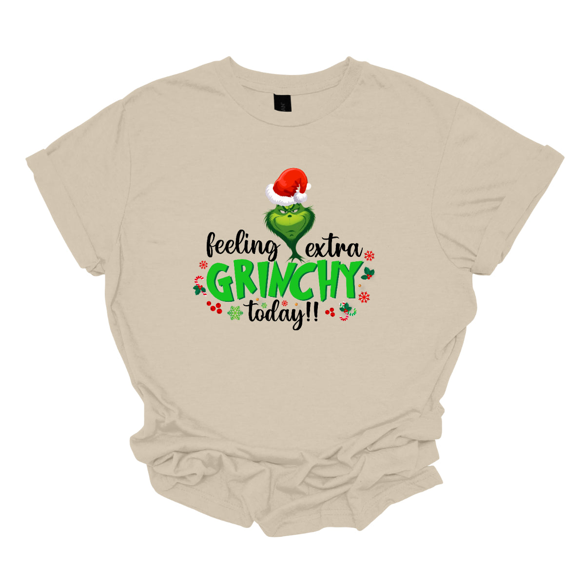 This T-shirt design exudes festive cheer and playful humor with its vibrant and eye-catching elements. The front of the shirt features the phrase, "Feeling extra grinchy today!!" prominently displayed in a fun and engaging. Shop Gorgeousware.com